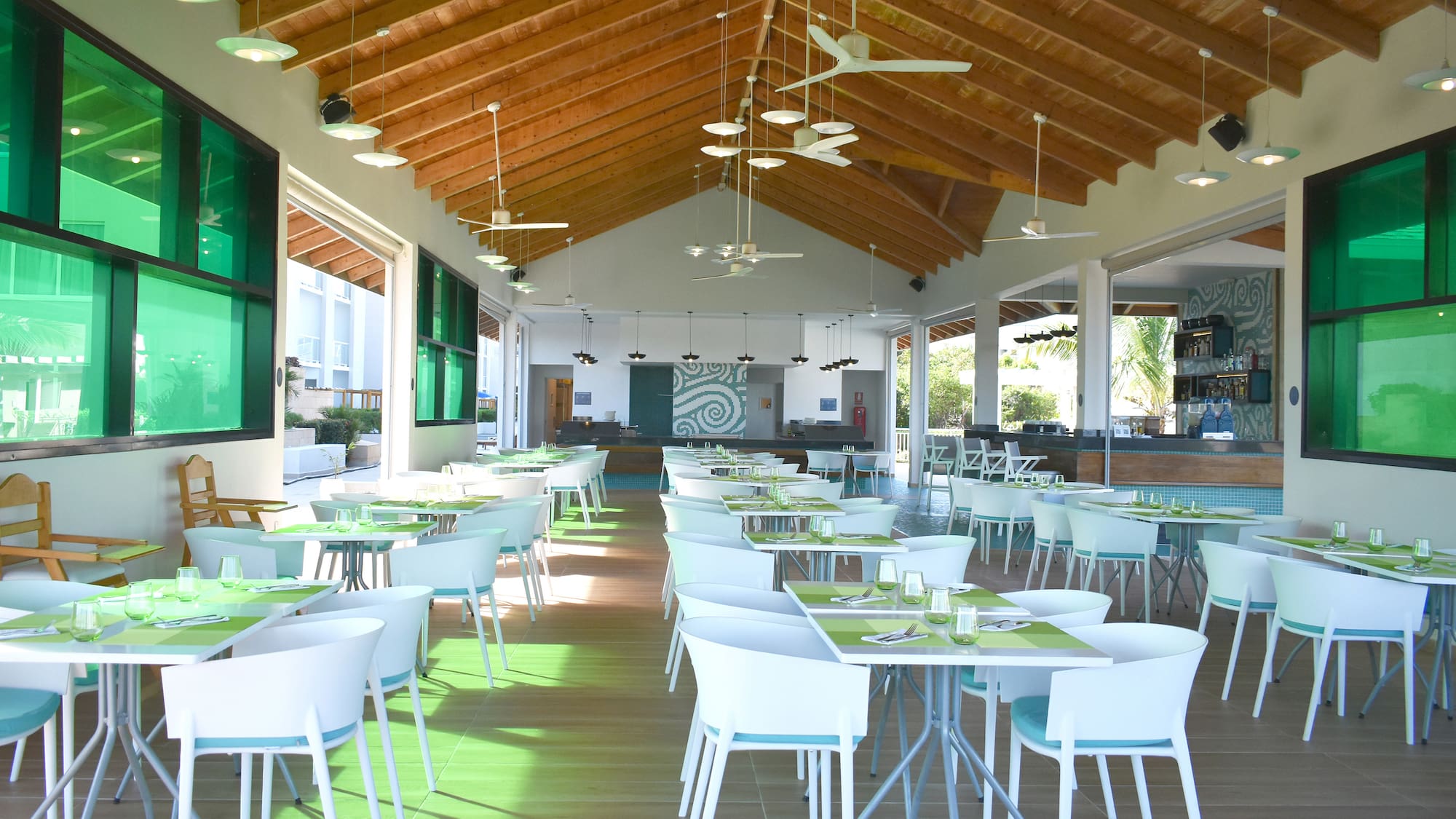 a room with tables and chairs
