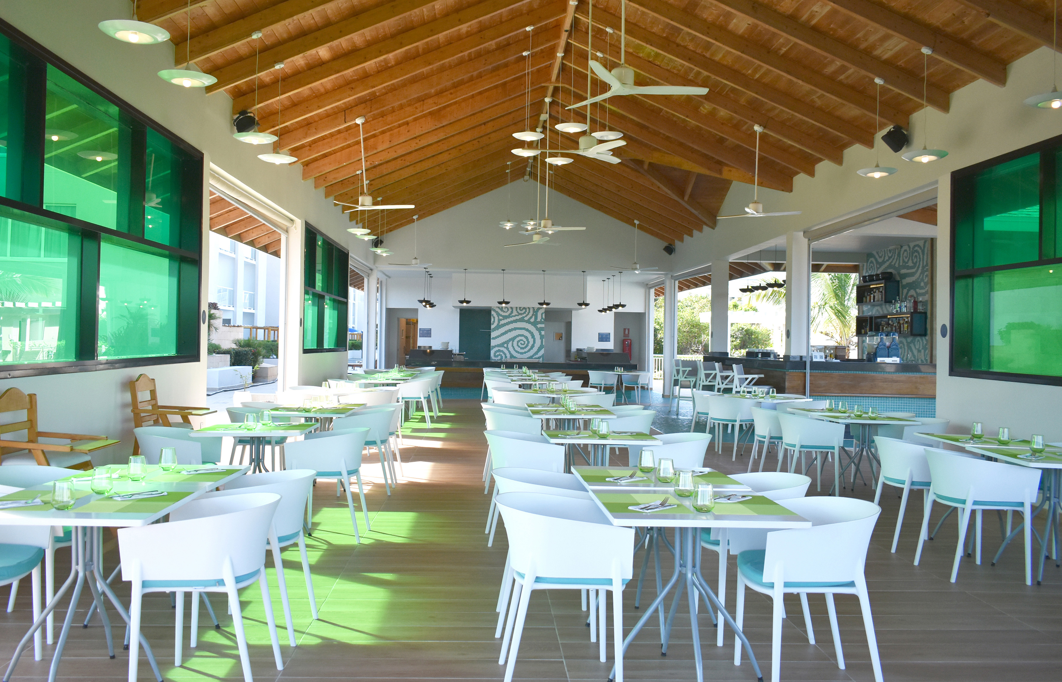 a room with tables and chairs