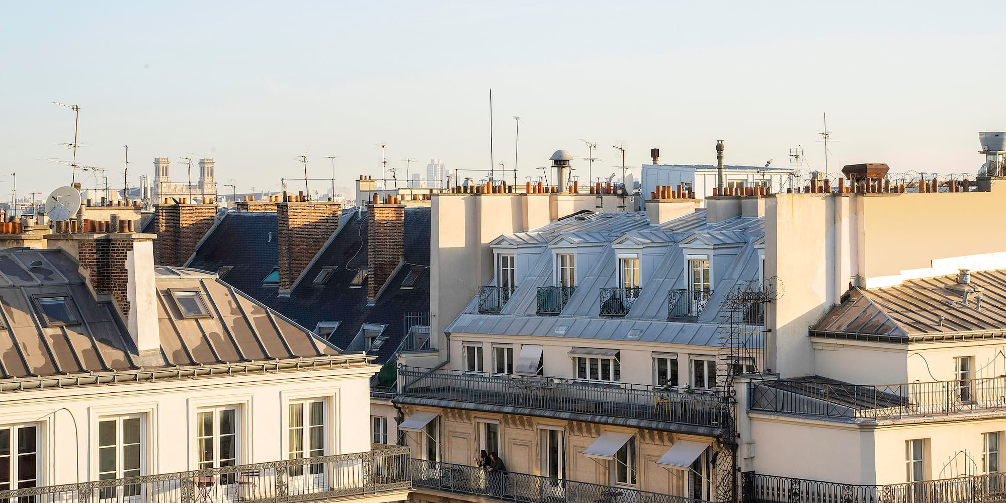 a group of buildings with a balcony