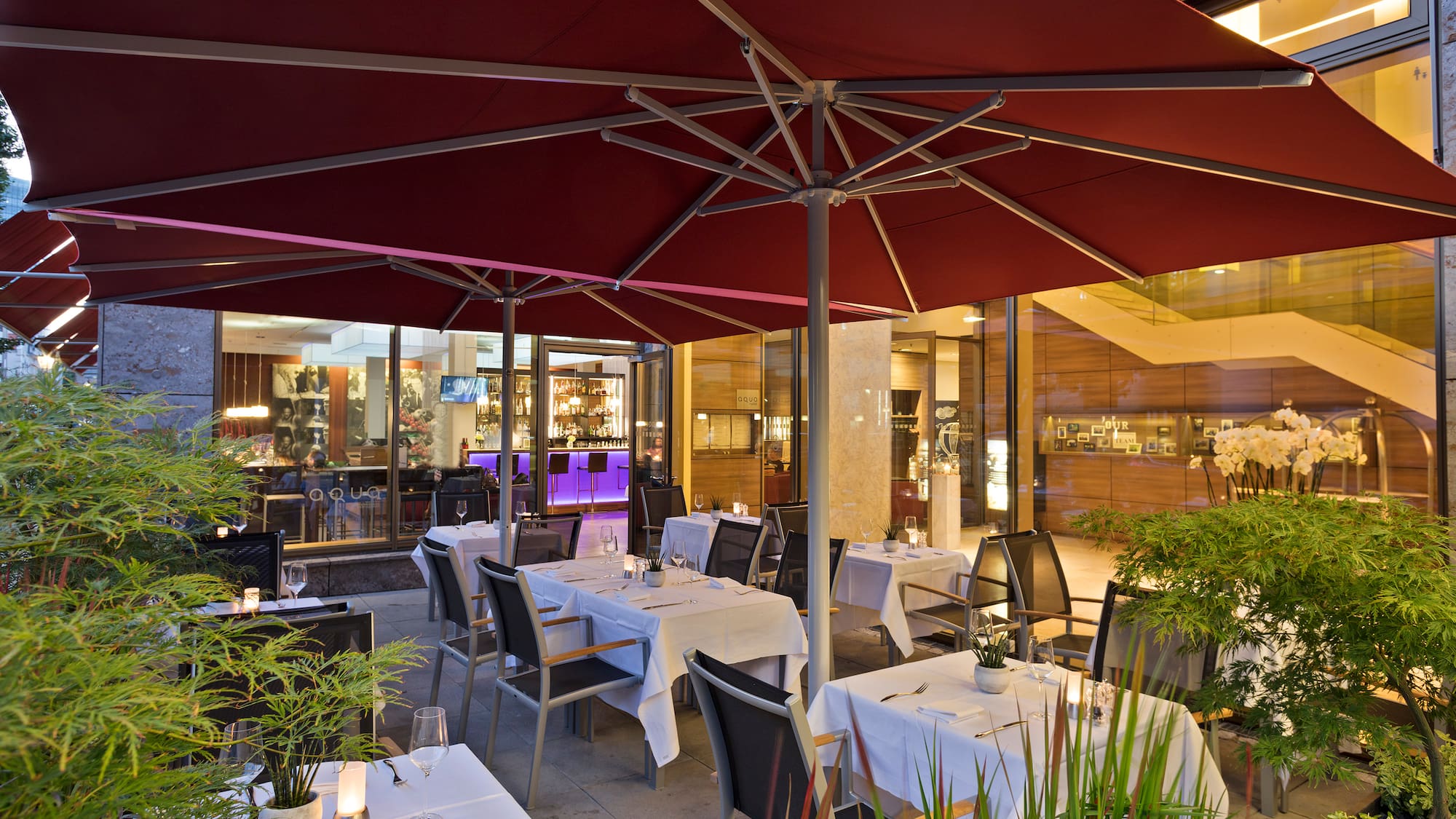 a restaurant with tables and chairs
