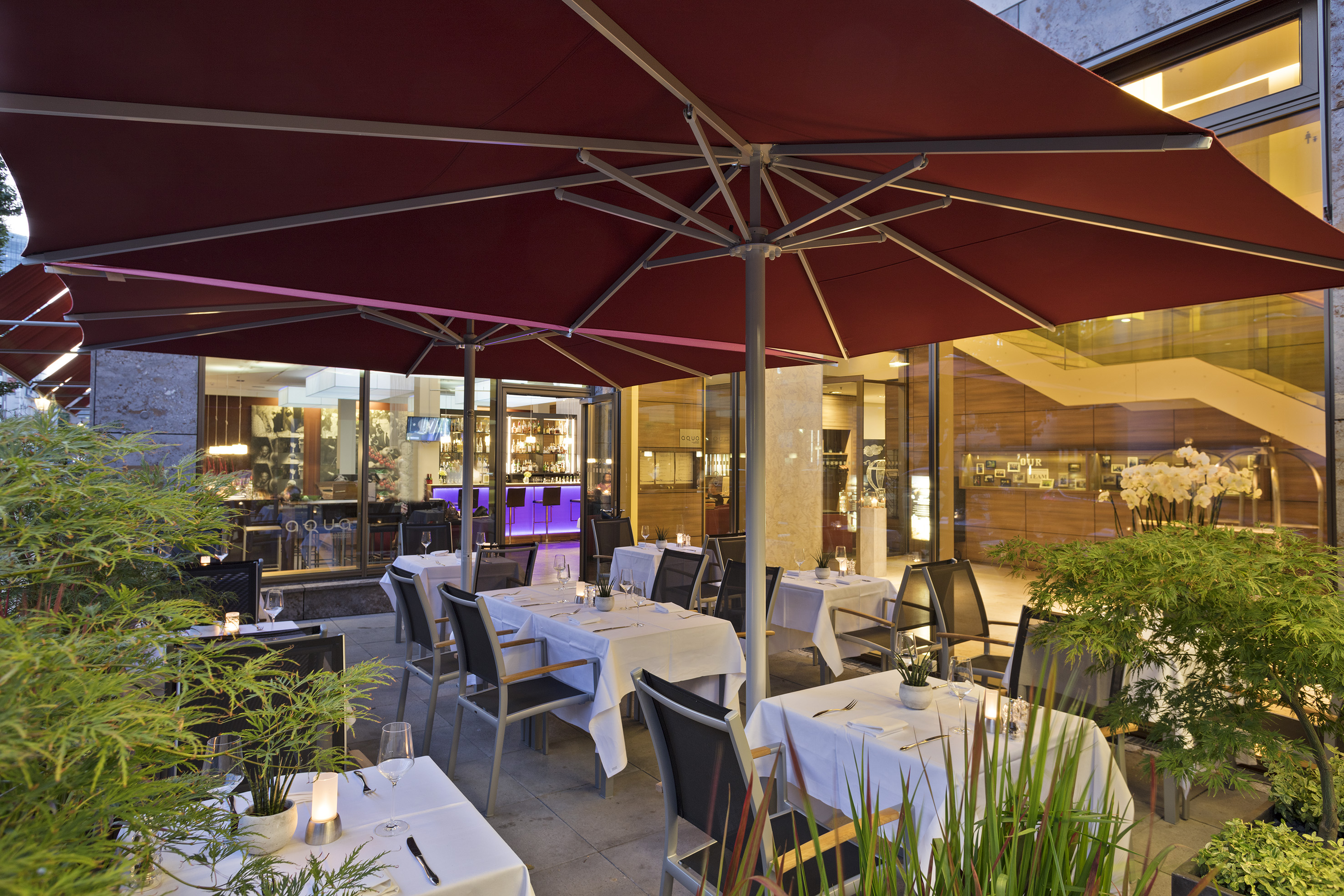 a restaurant with tables and chairs