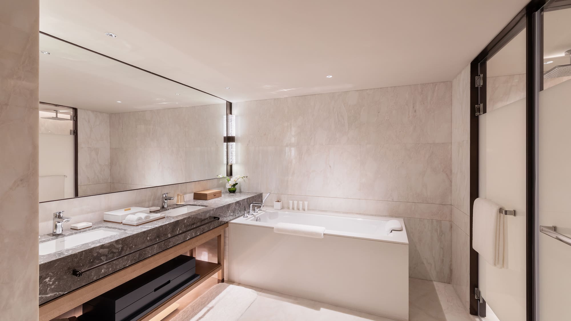 a bathroom with a bathtub and sink