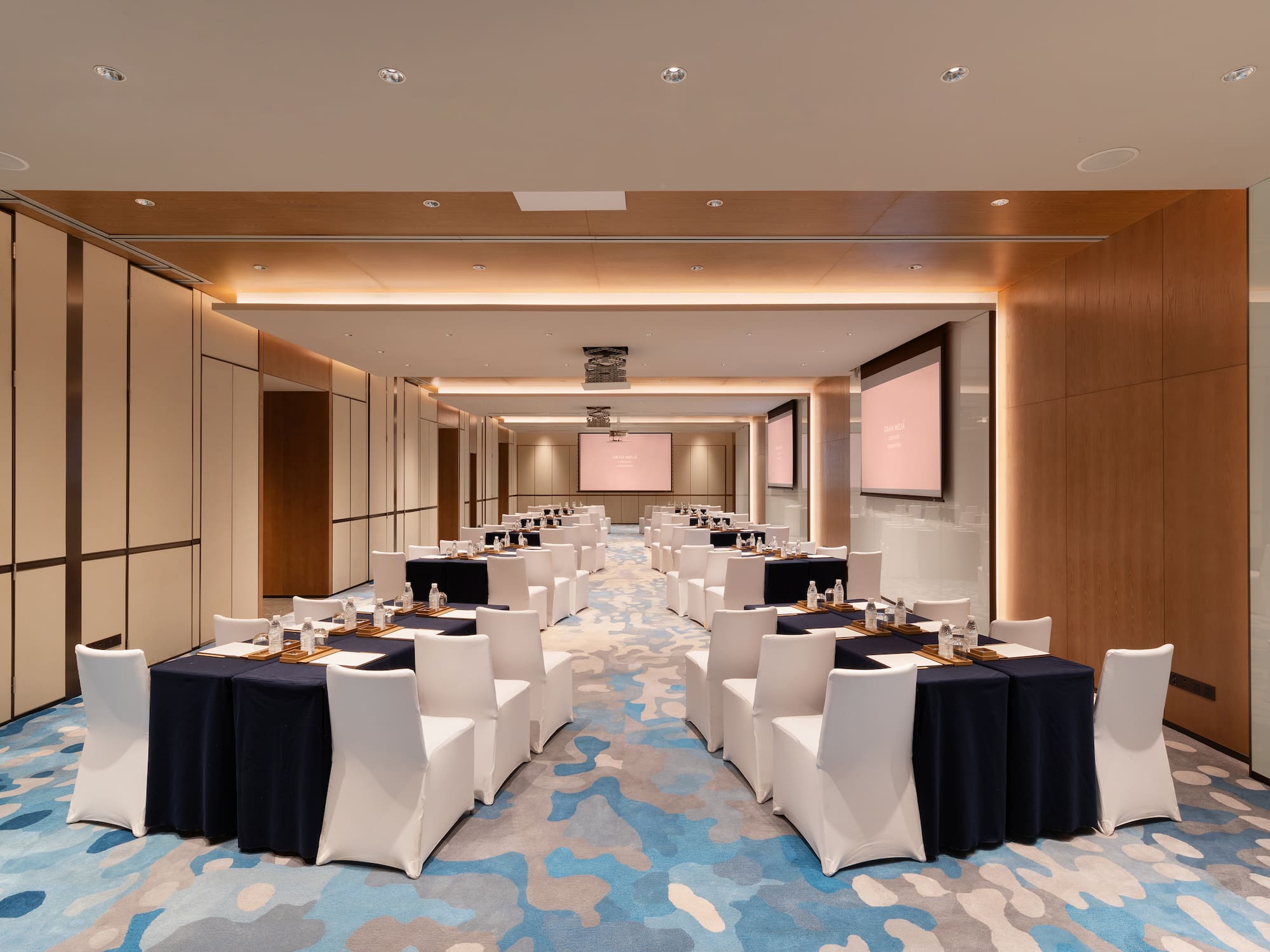 a room with tables and chairs