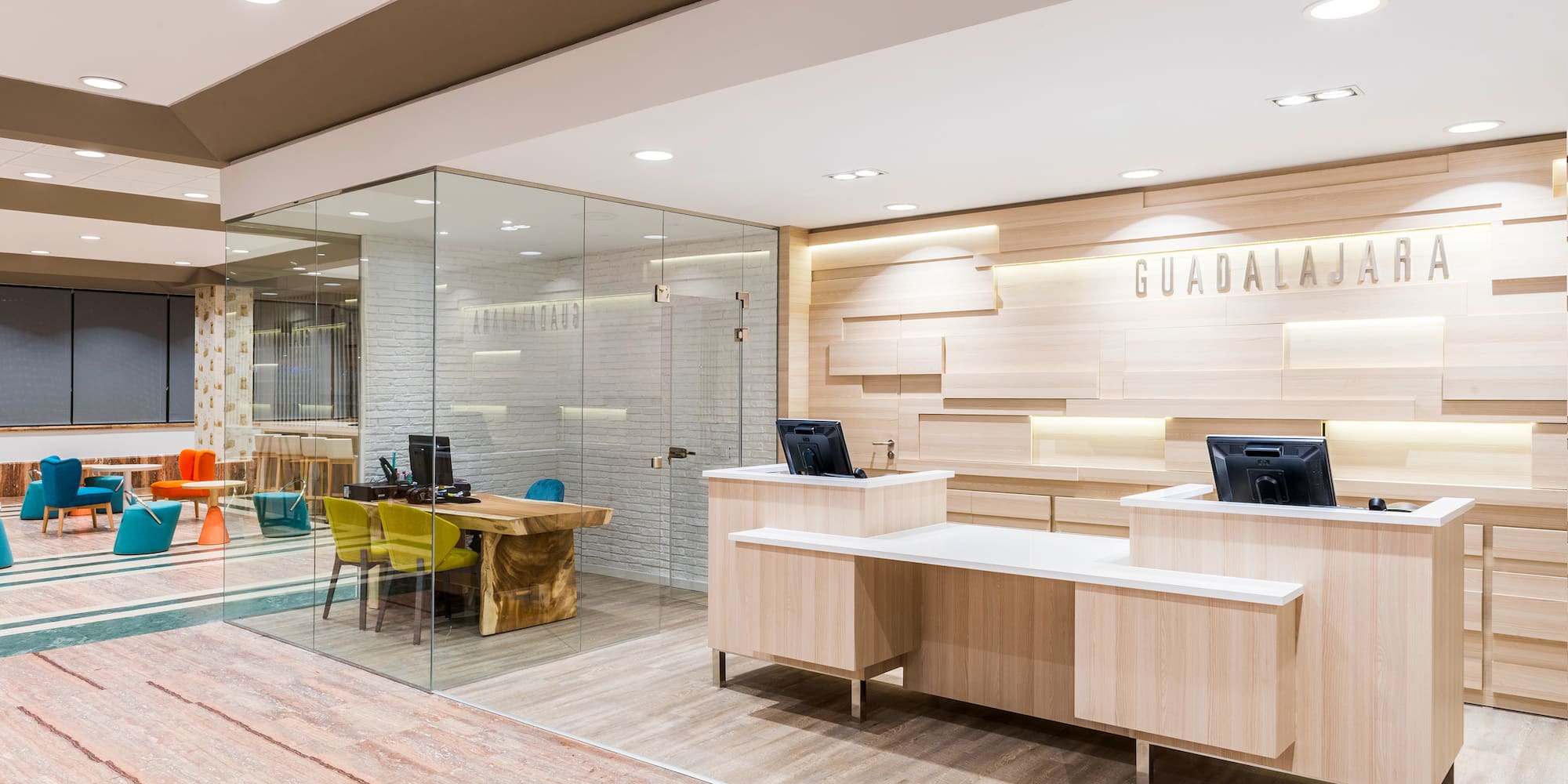a reception desks and a glass wall