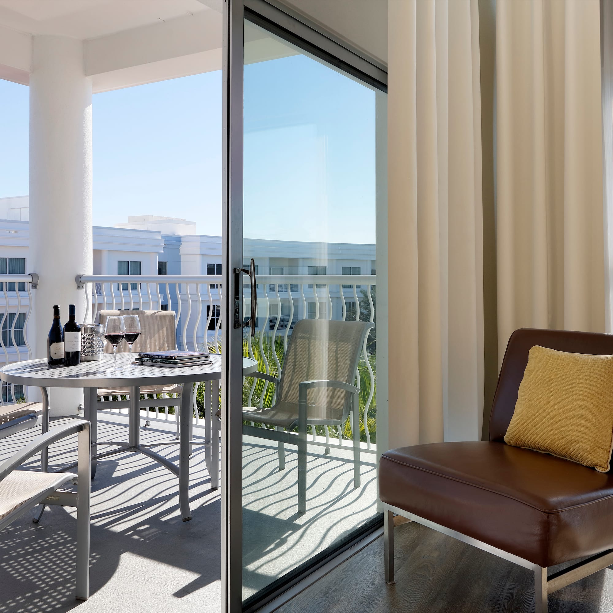 a patio with a table and chairs