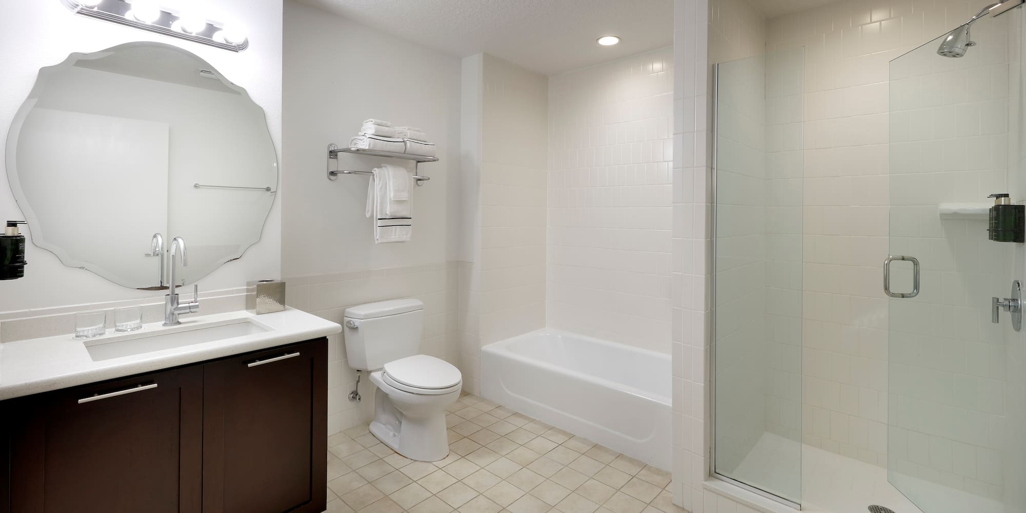 a bathroom with a shower and toilet