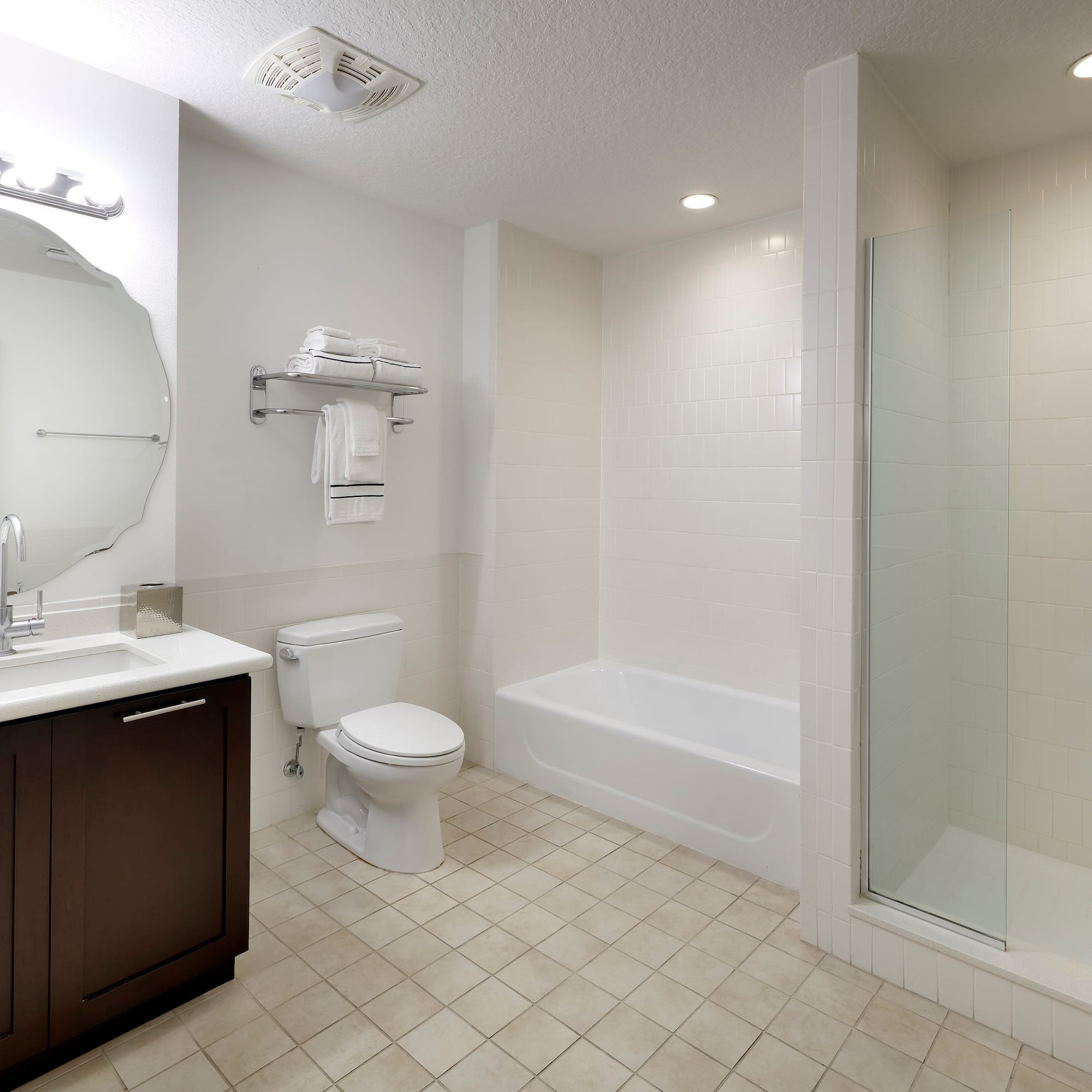 a bathroom with a shower and toilet