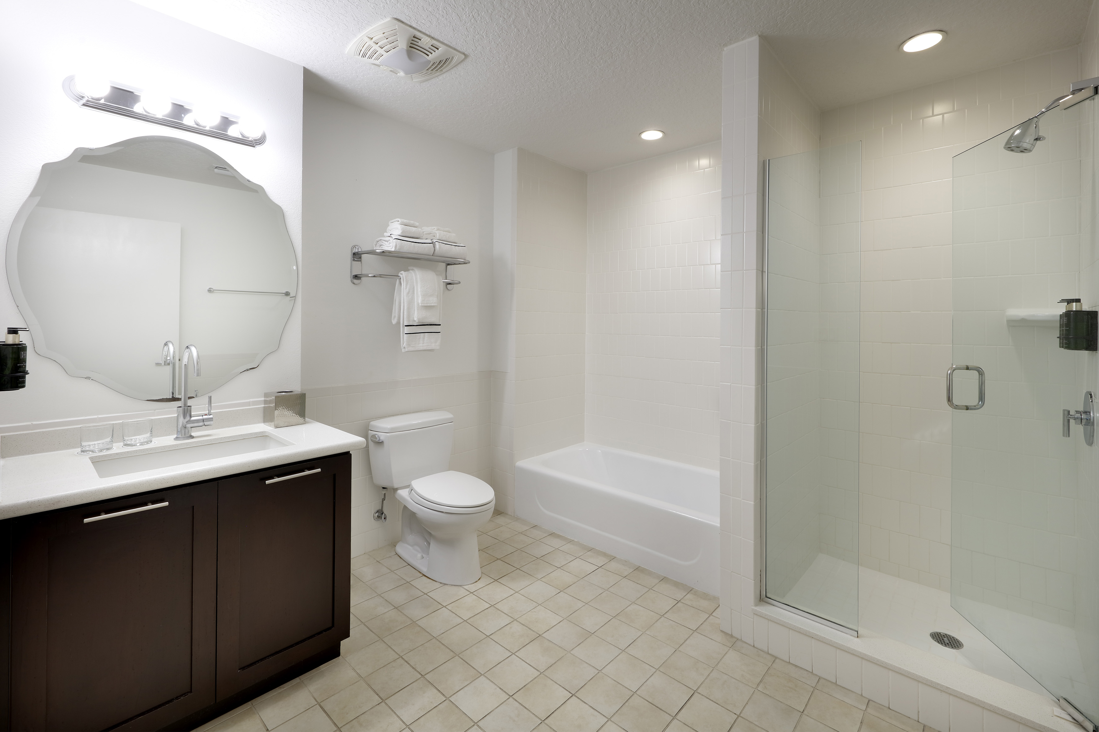 a bathroom with a shower and toilet
