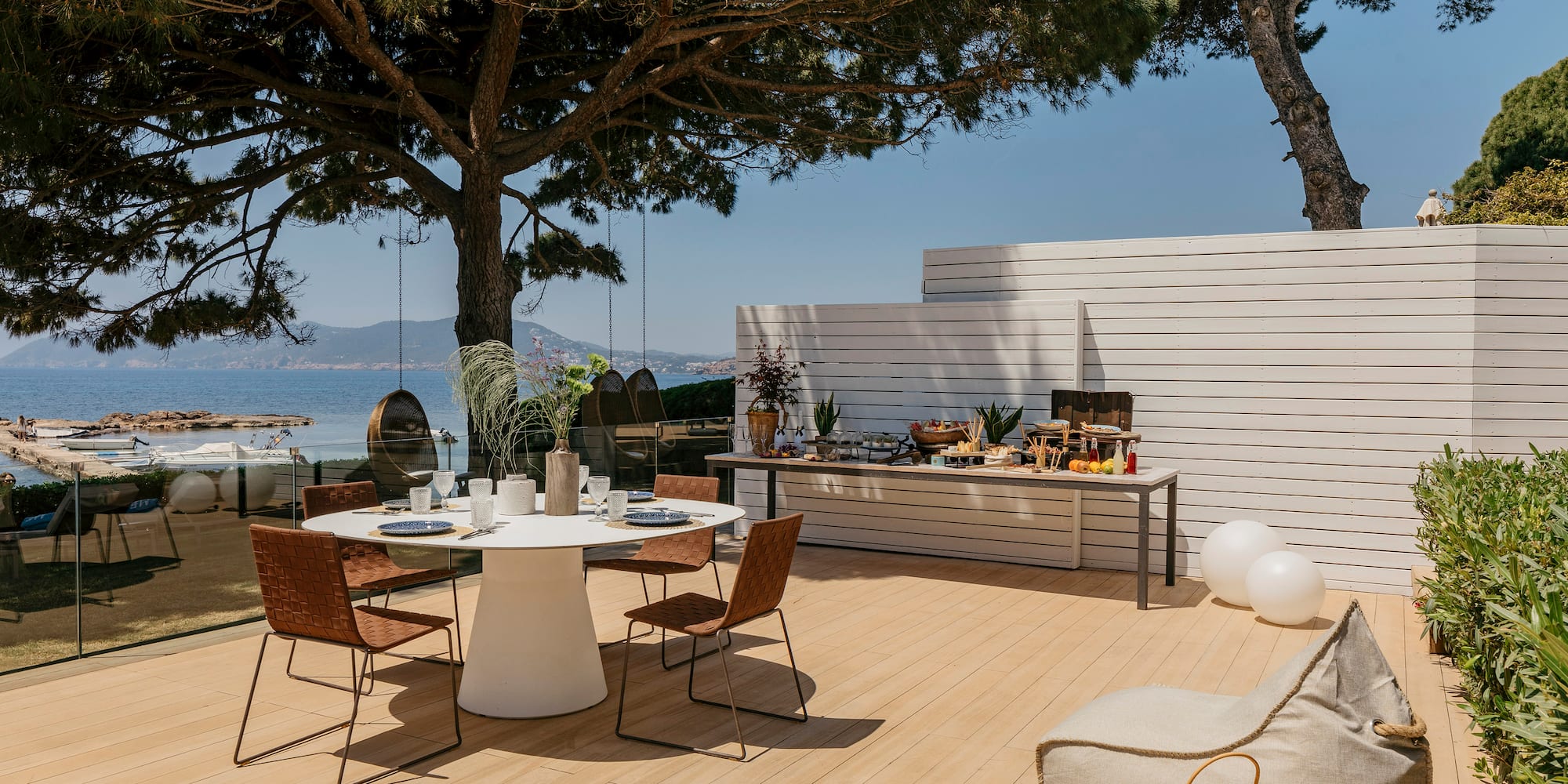 a table and chairs on a deck