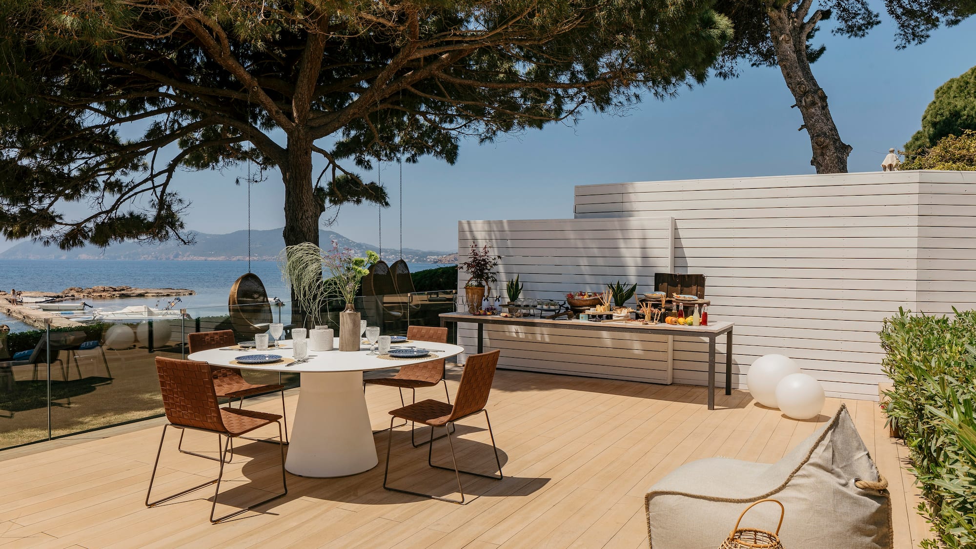 a table and chairs on a deck