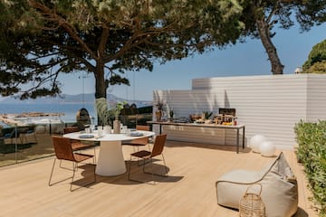 a table and chairs on a deck
