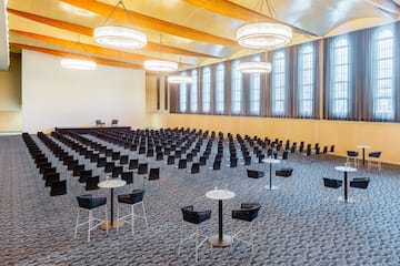 a large room with tables and chairs