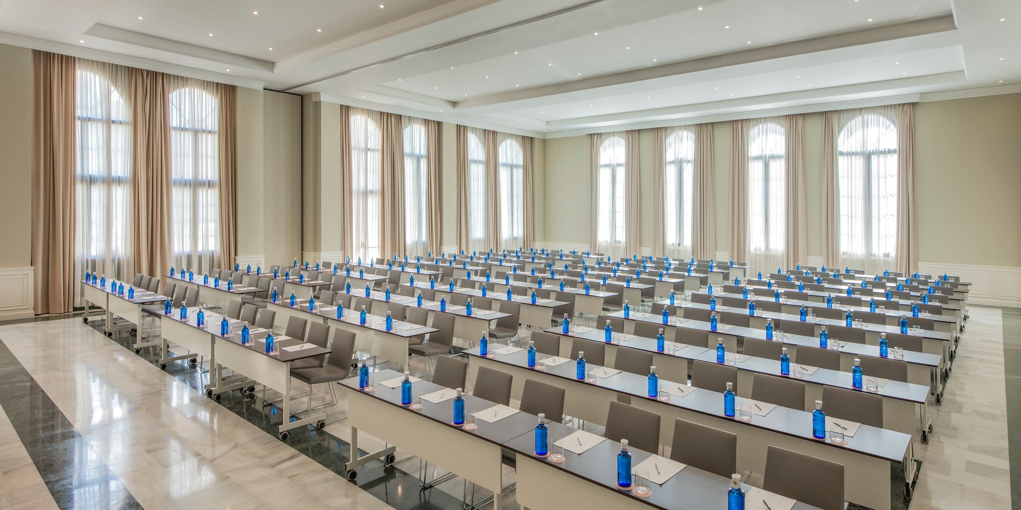 a room with tables and chairs