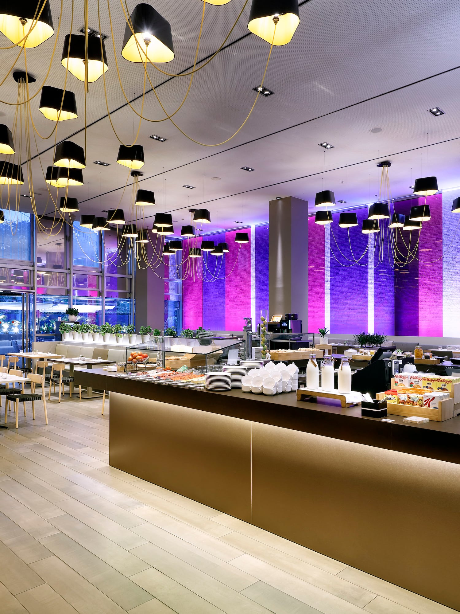 a restaurant with many tables and chairs