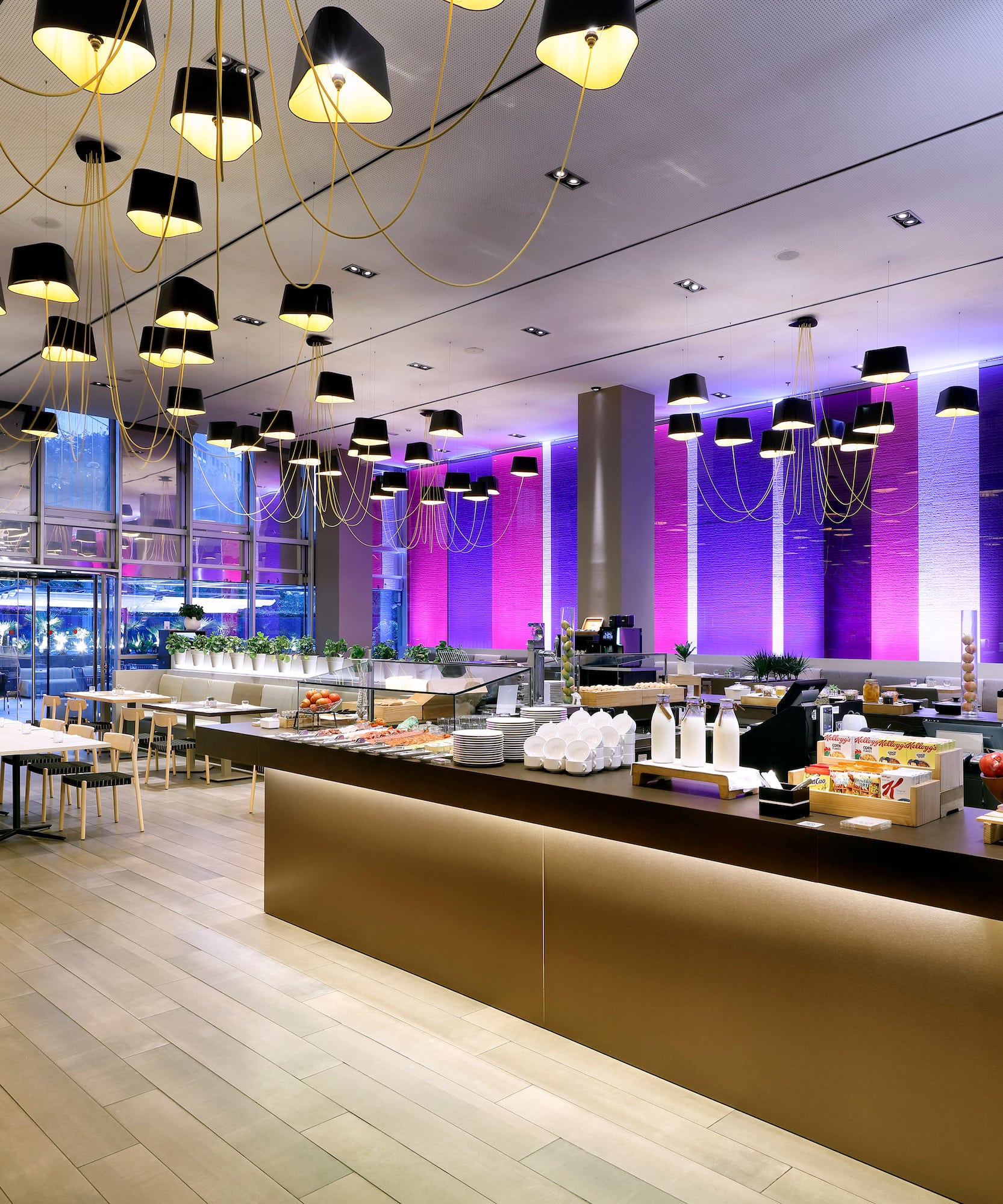 a restaurant with many tables and chairs