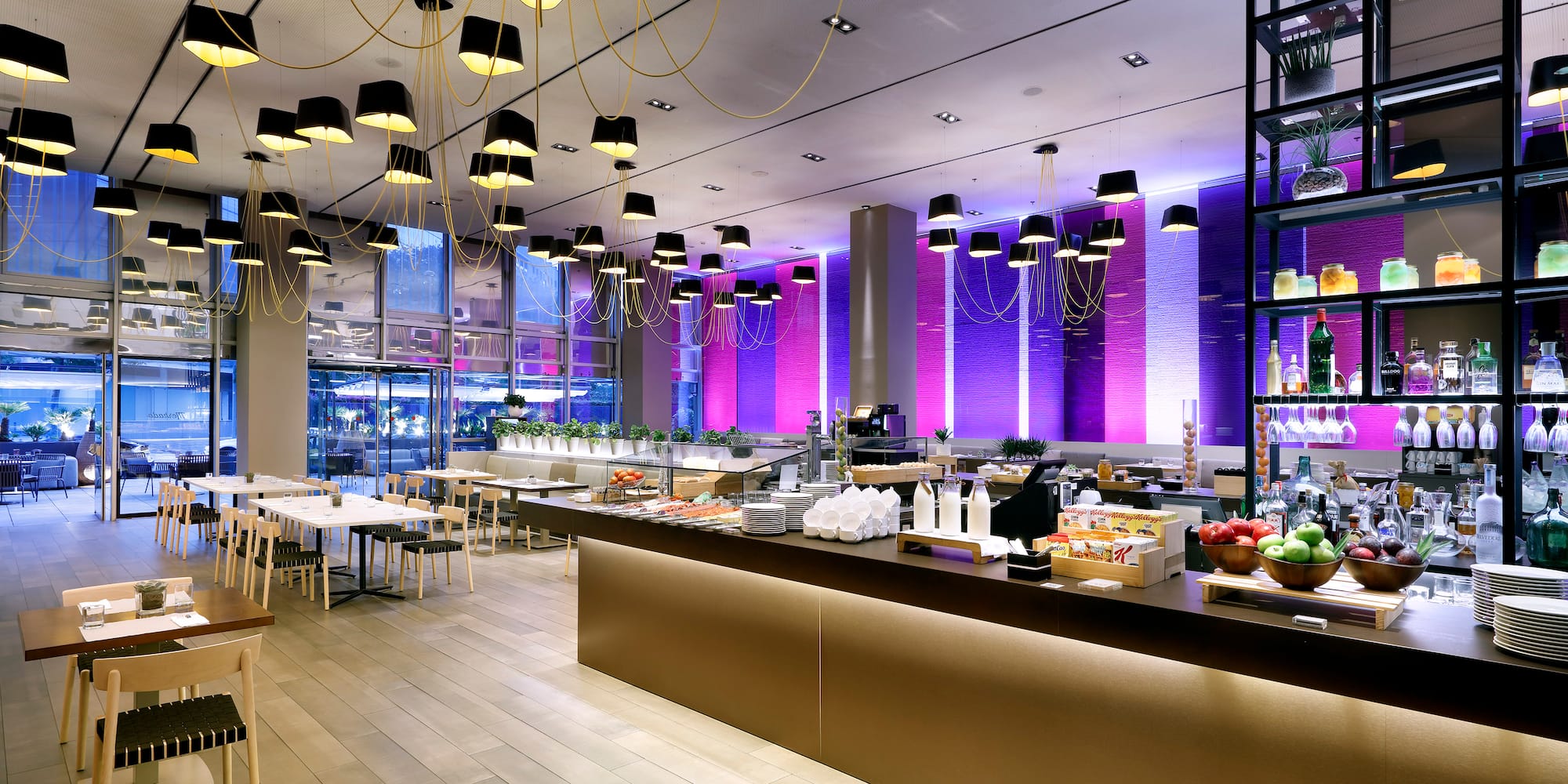 a restaurant with many tables and chairs