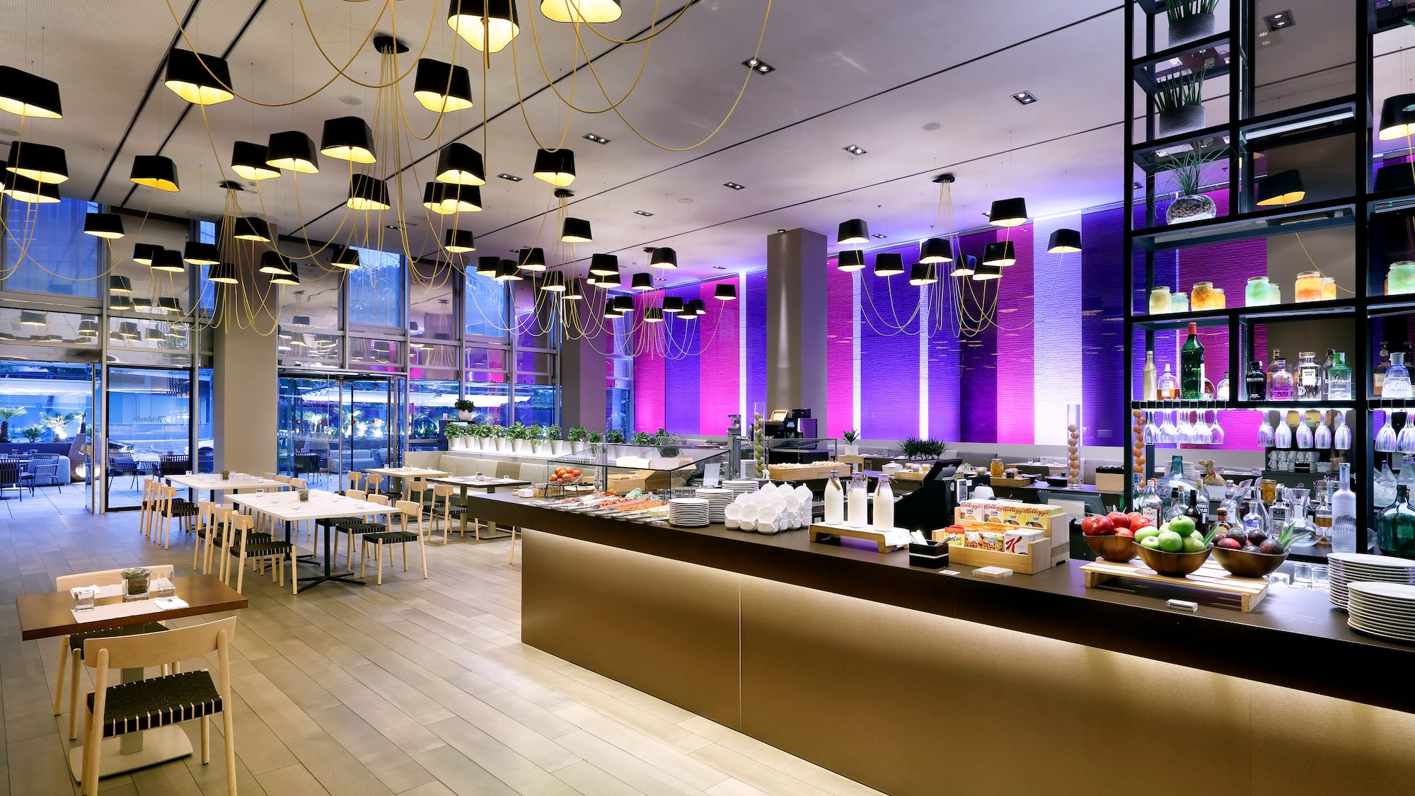 a restaurant with many tables and chairs