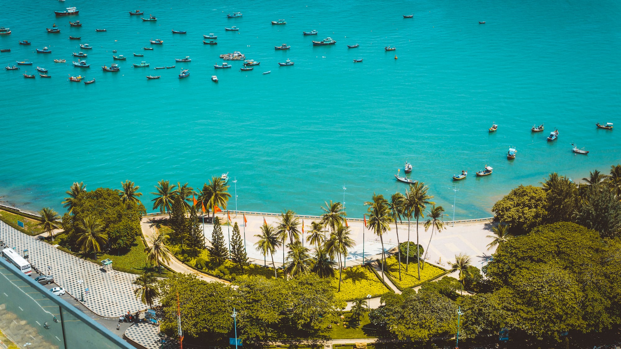 a body of water with boats and trees