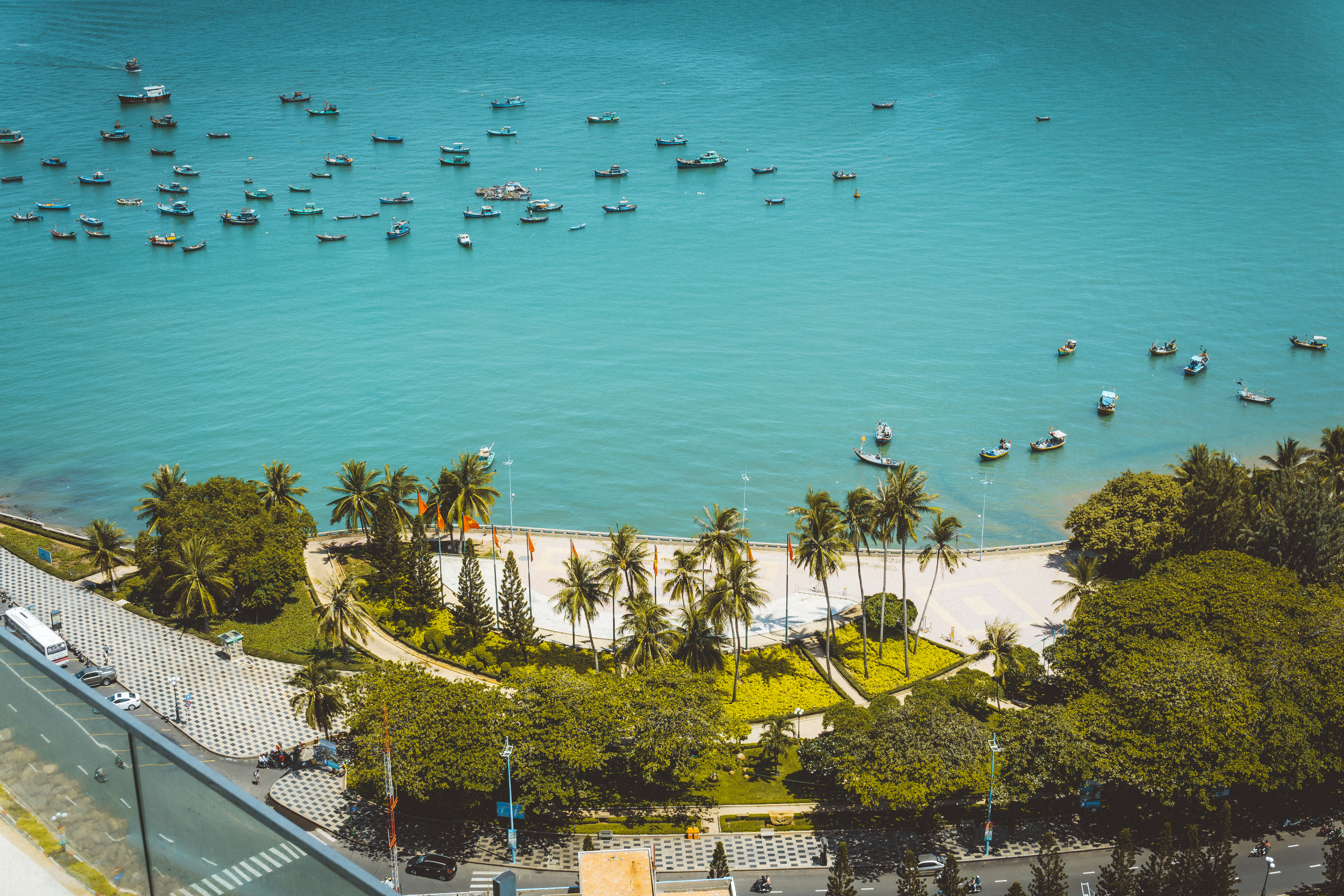 a body of water with boats and trees
