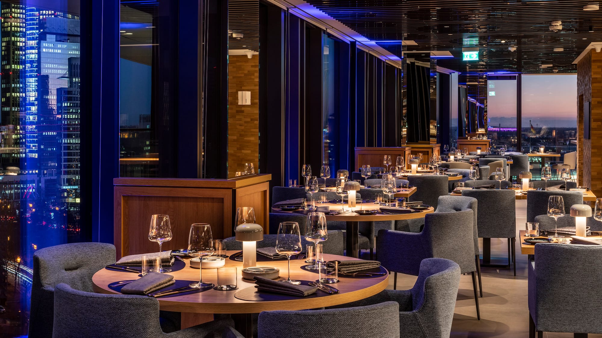 a restaurant with tables and chairs