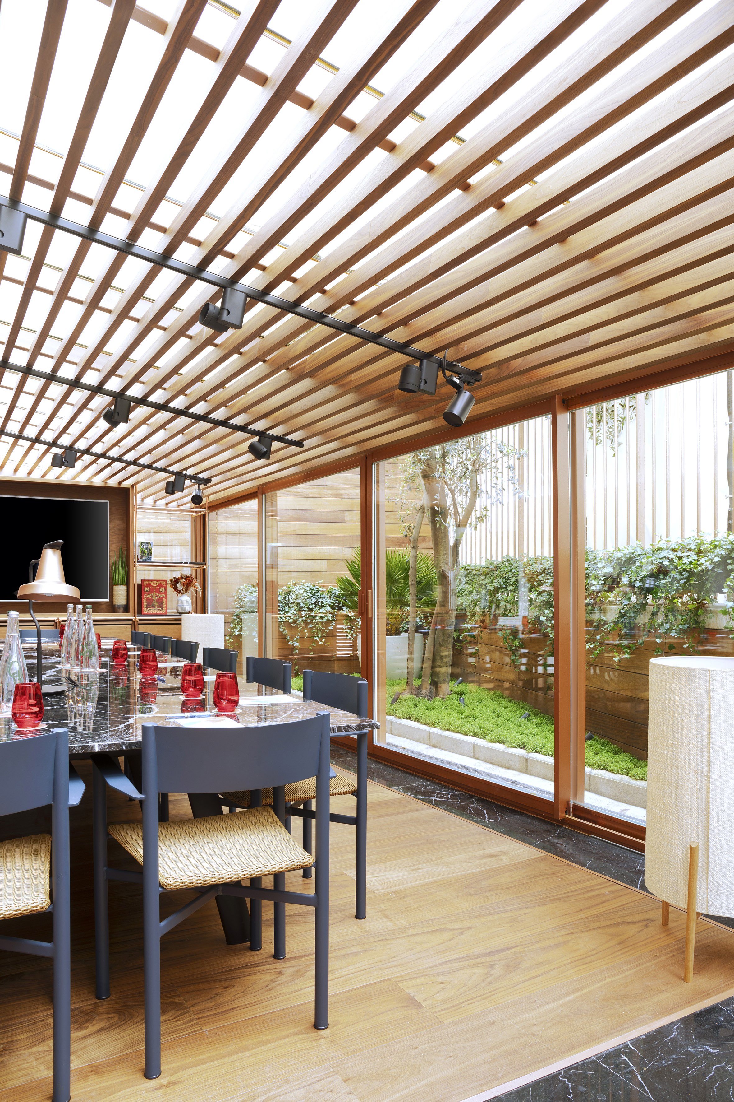 a dining room with a table and chairs
