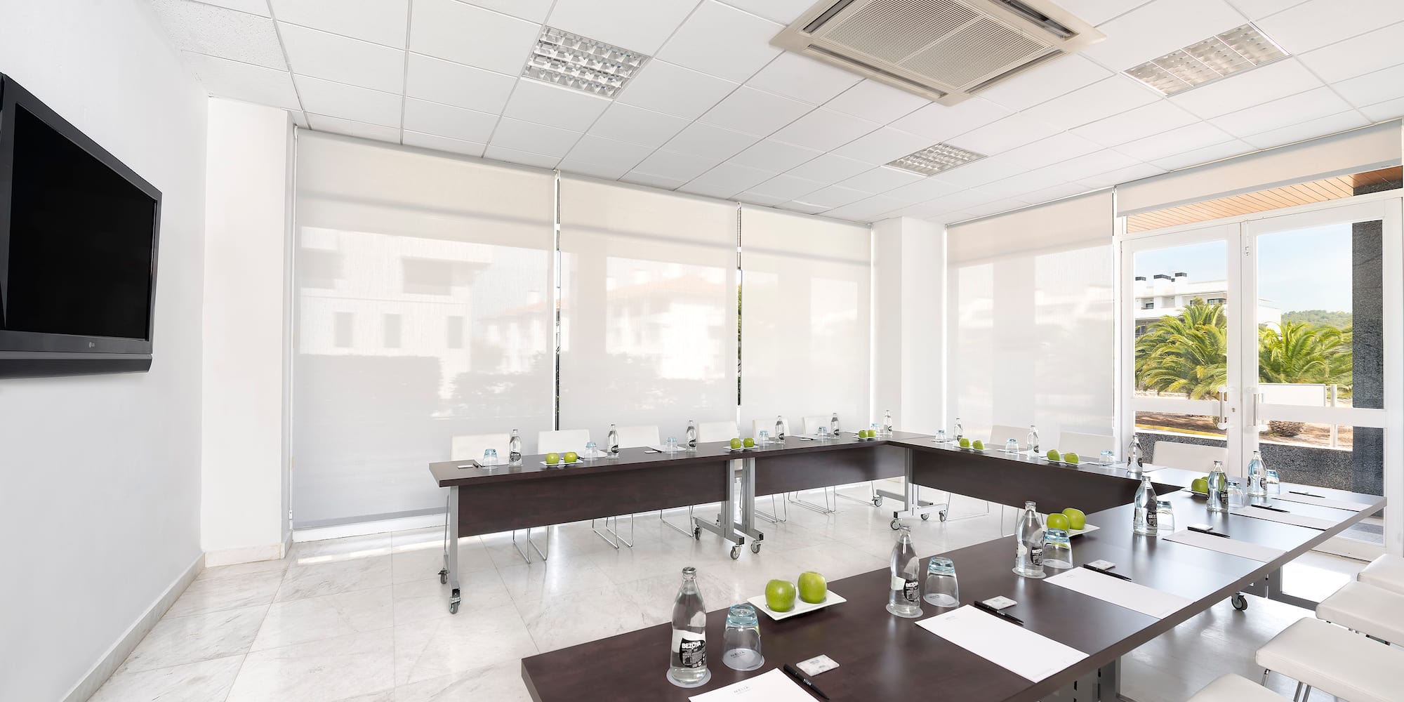 a room with tables and chairs