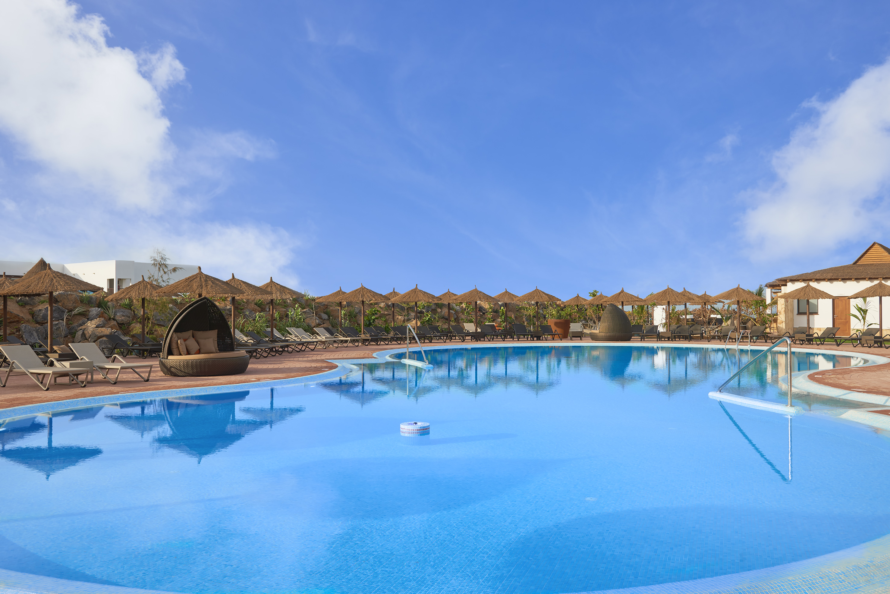 a pool with a large body of water