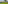 Tropical golf course with green, lake, palm trees, and a white flag.