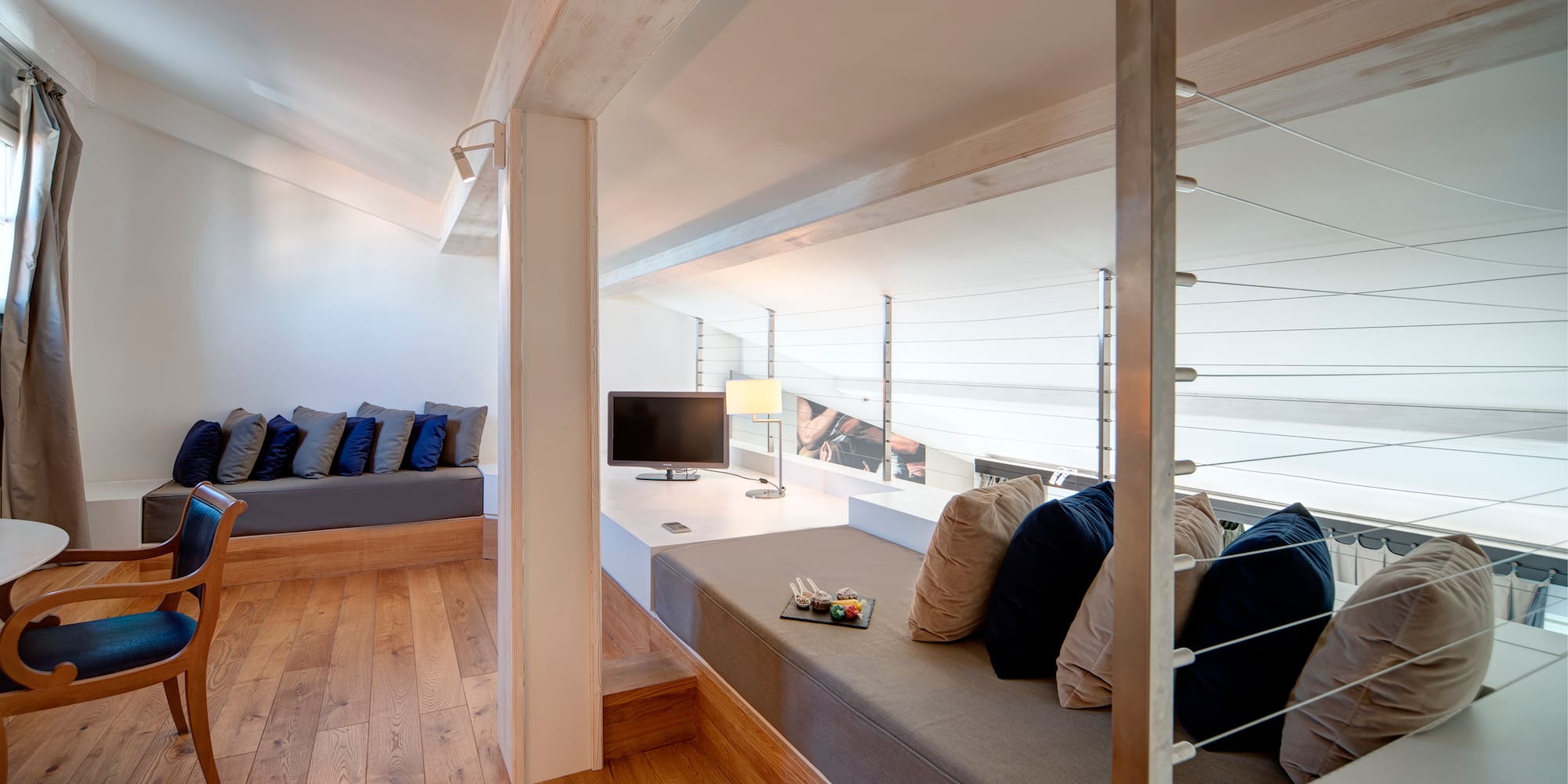 a room with a couch and a television