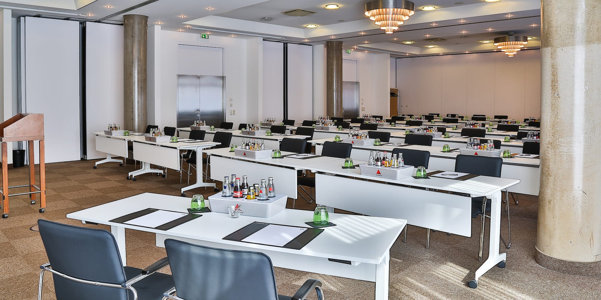 a room with tables and chairs