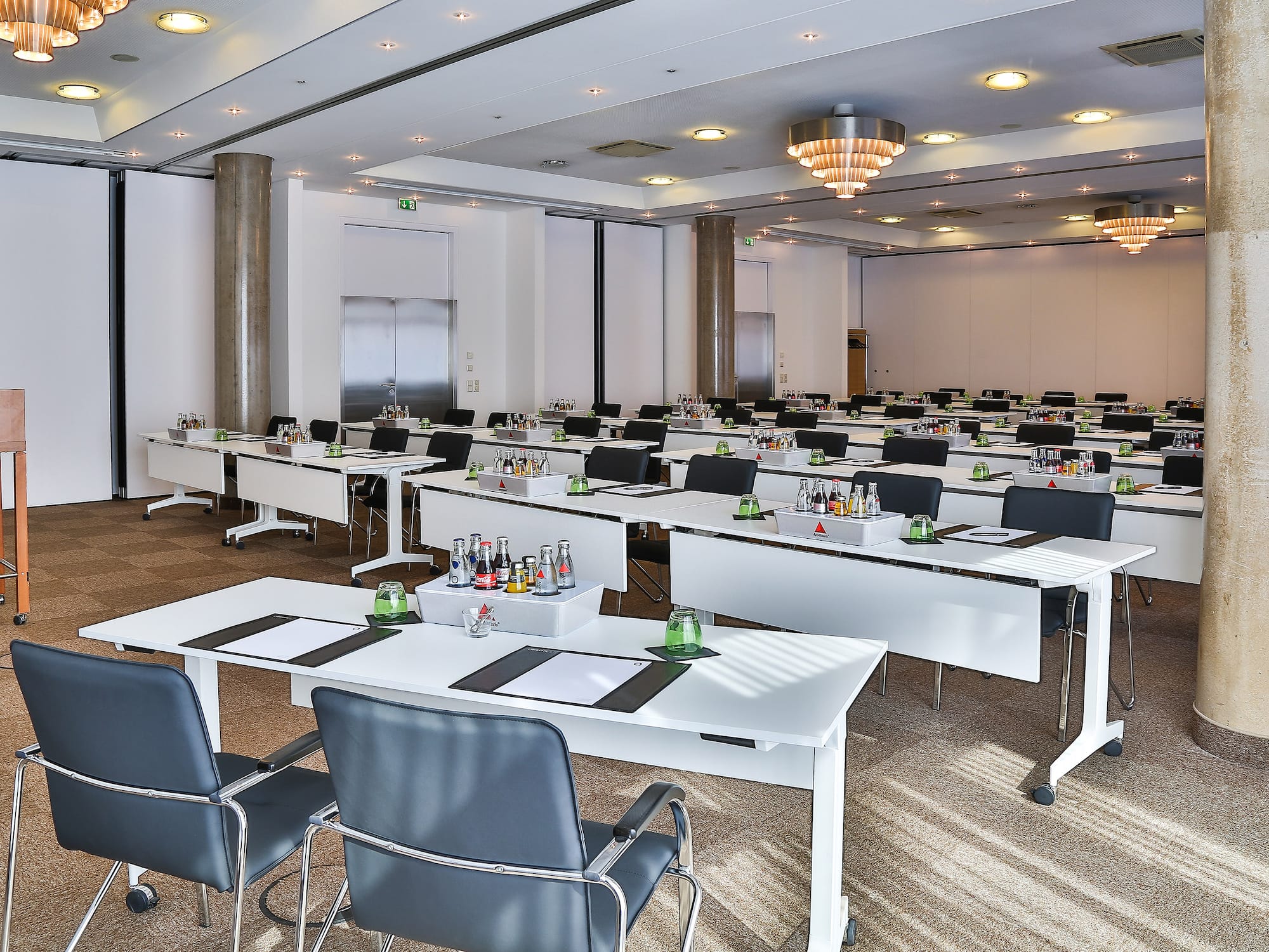 a room with tables and chairs