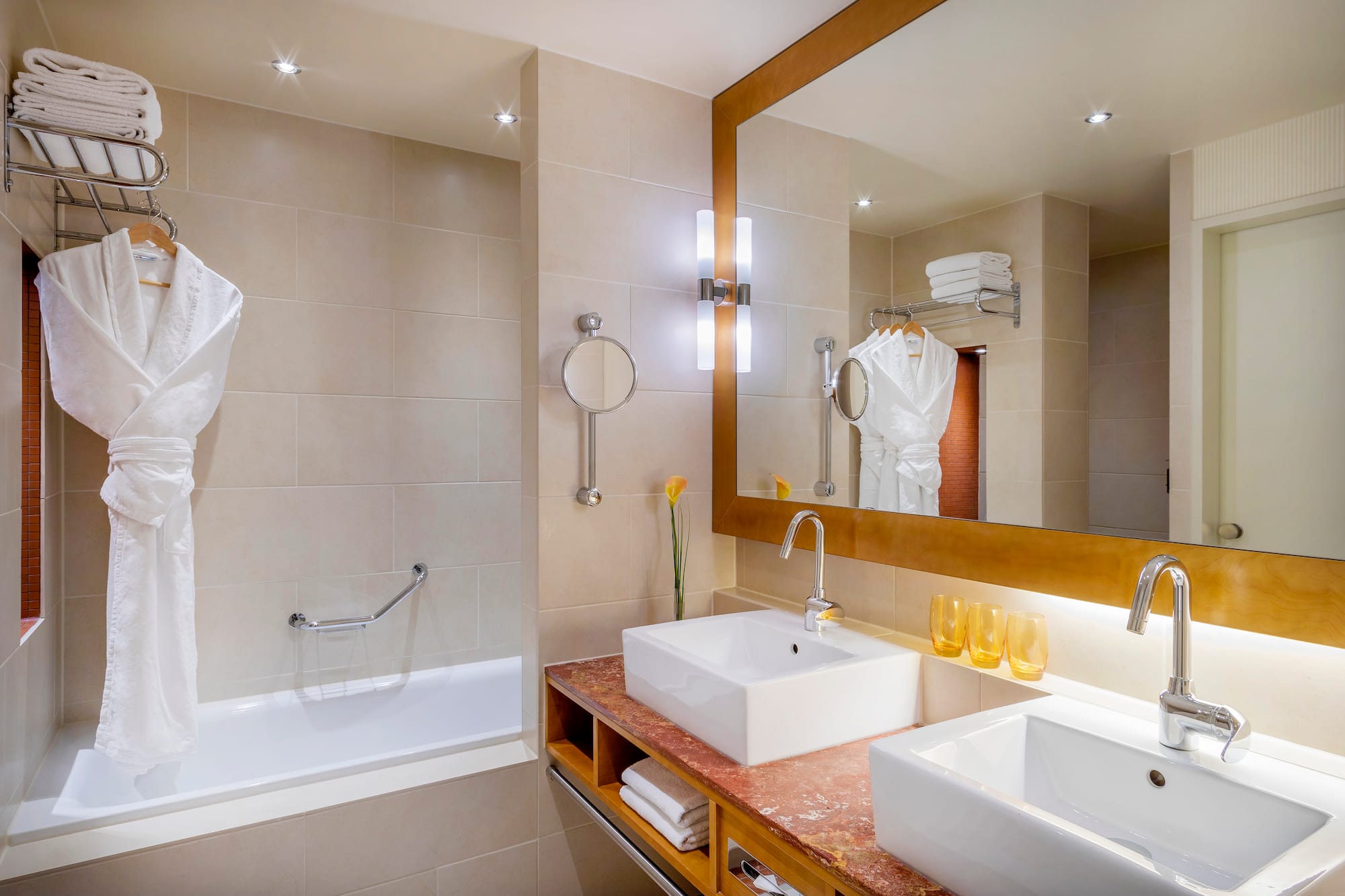 a bathroom with a mirror and sink