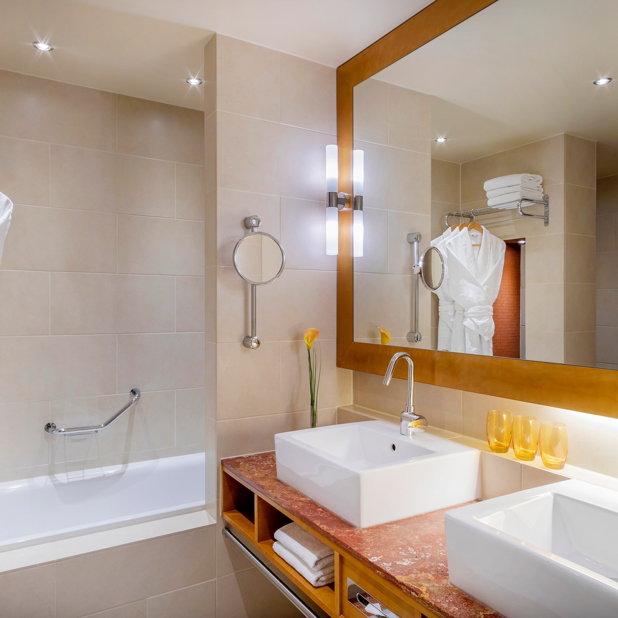 a bathroom with a mirror and sink