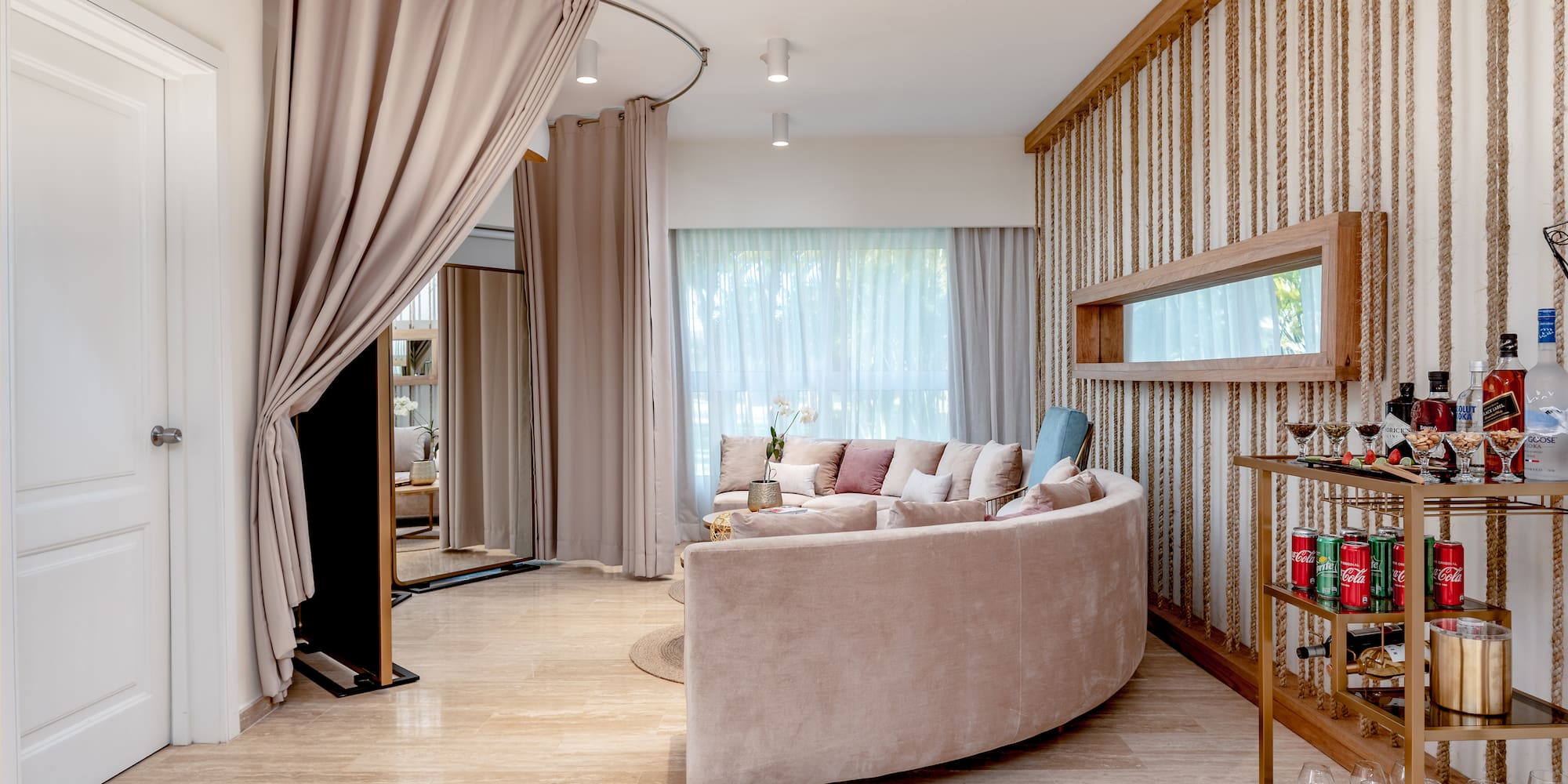 a room with a couch and a shelf