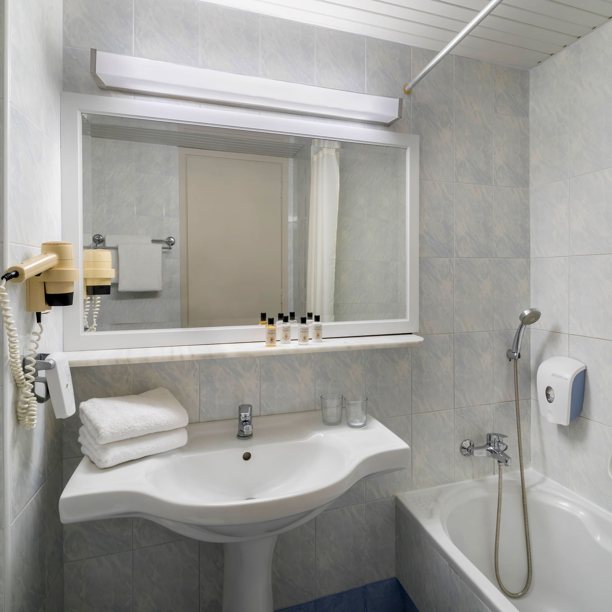 a bathroom with a sink and bathtub