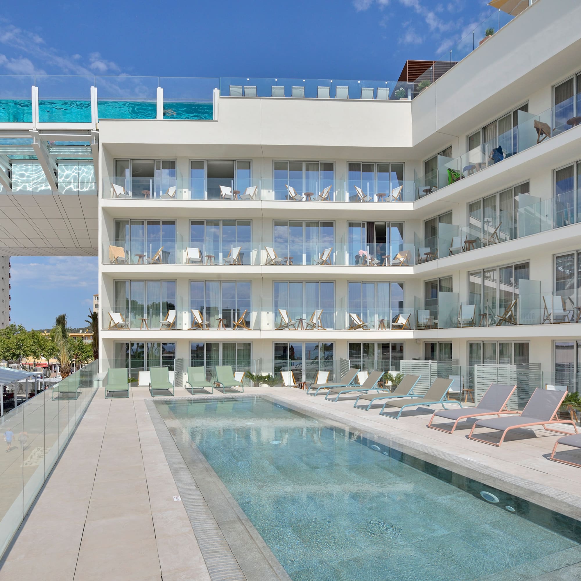 a pool in front of a building