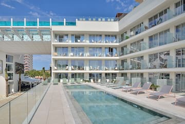 a pool in front of a building