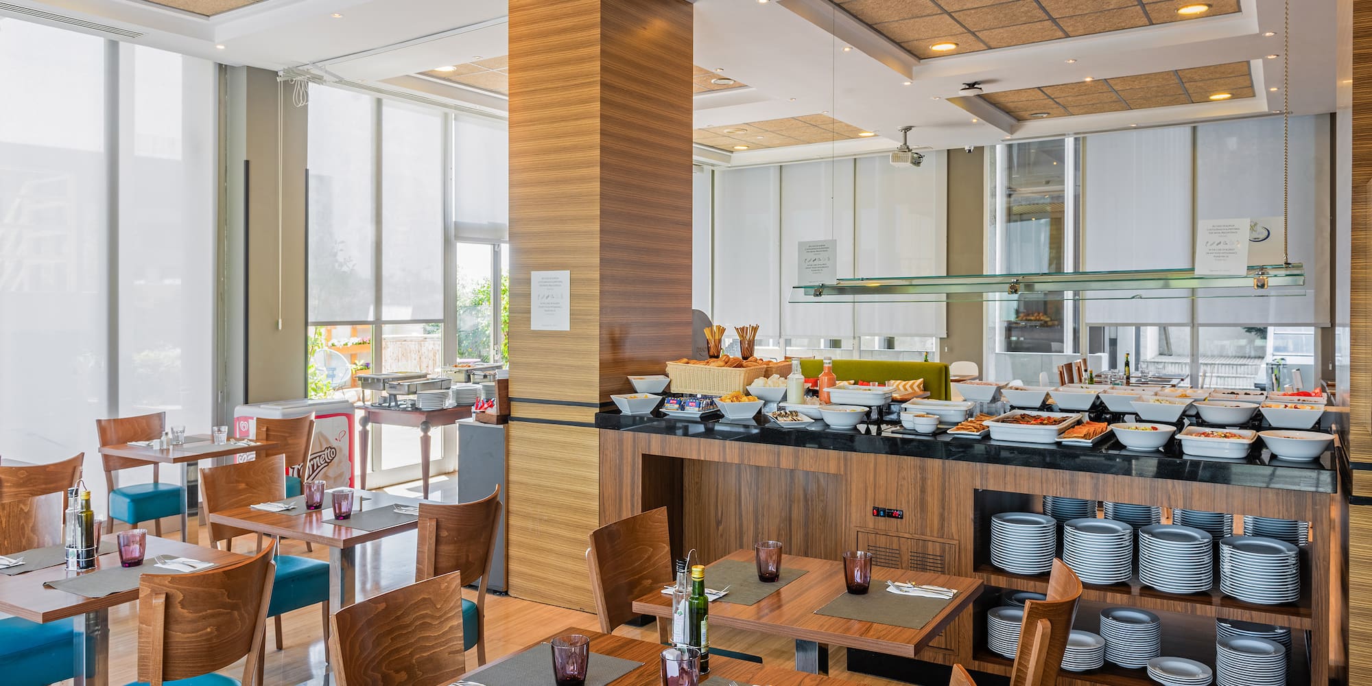 a restaurant with tables and chairs