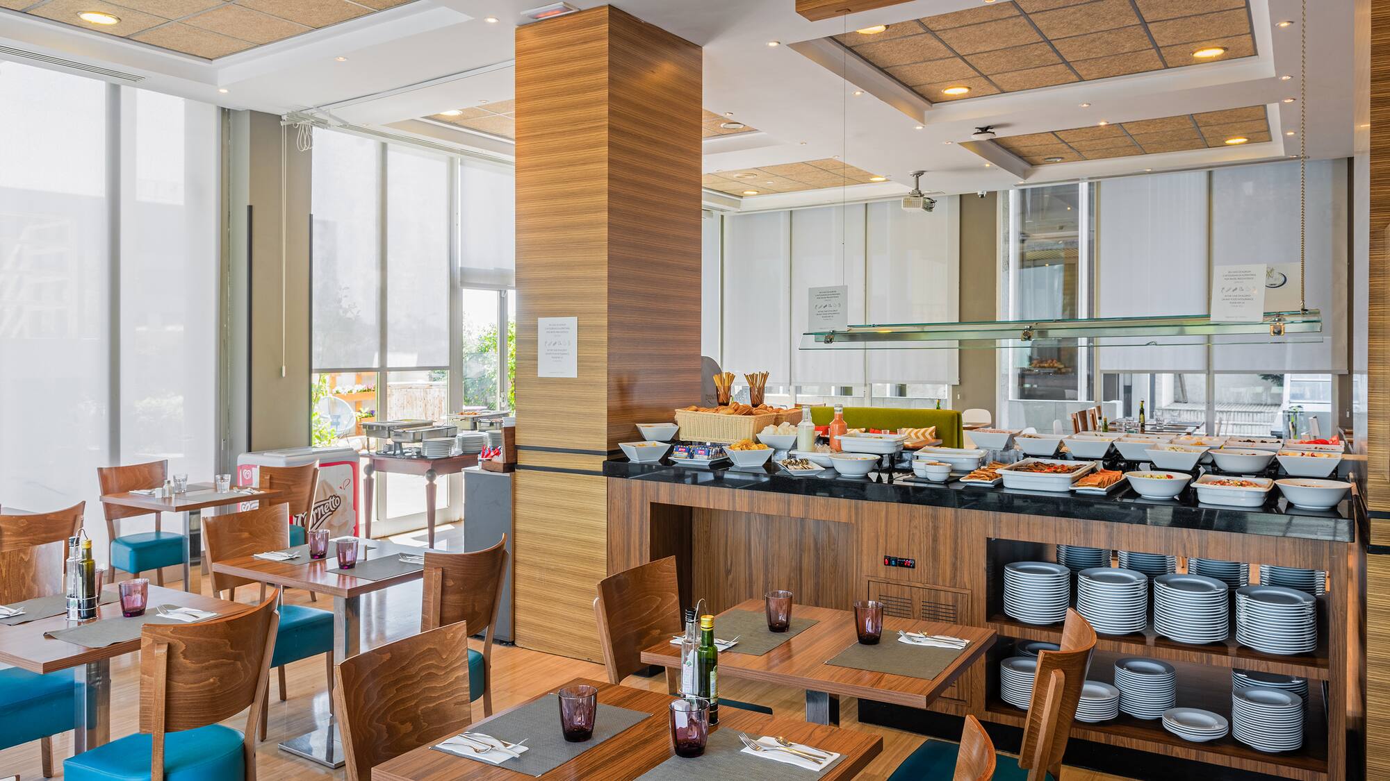 a restaurant with tables and chairs