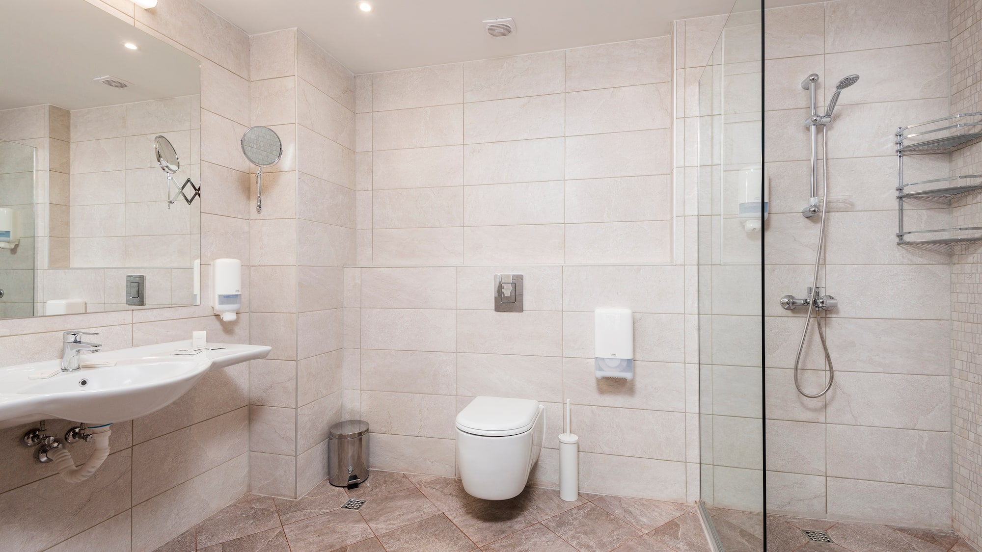 a bathroom with a shower and toilet