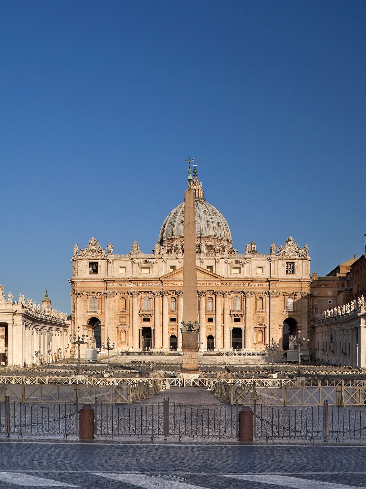 a large building with a dome and a pillar