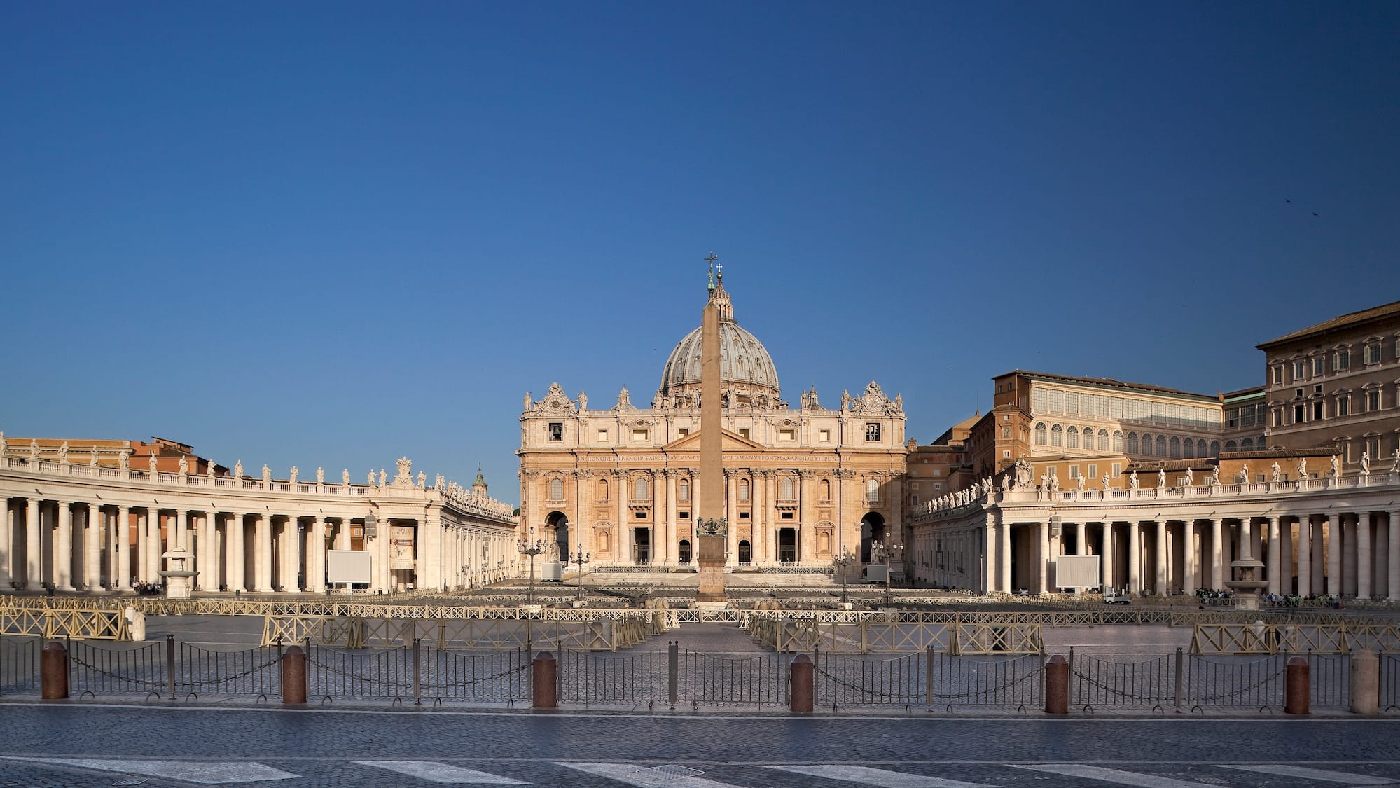 a large building with a dome and a pillar