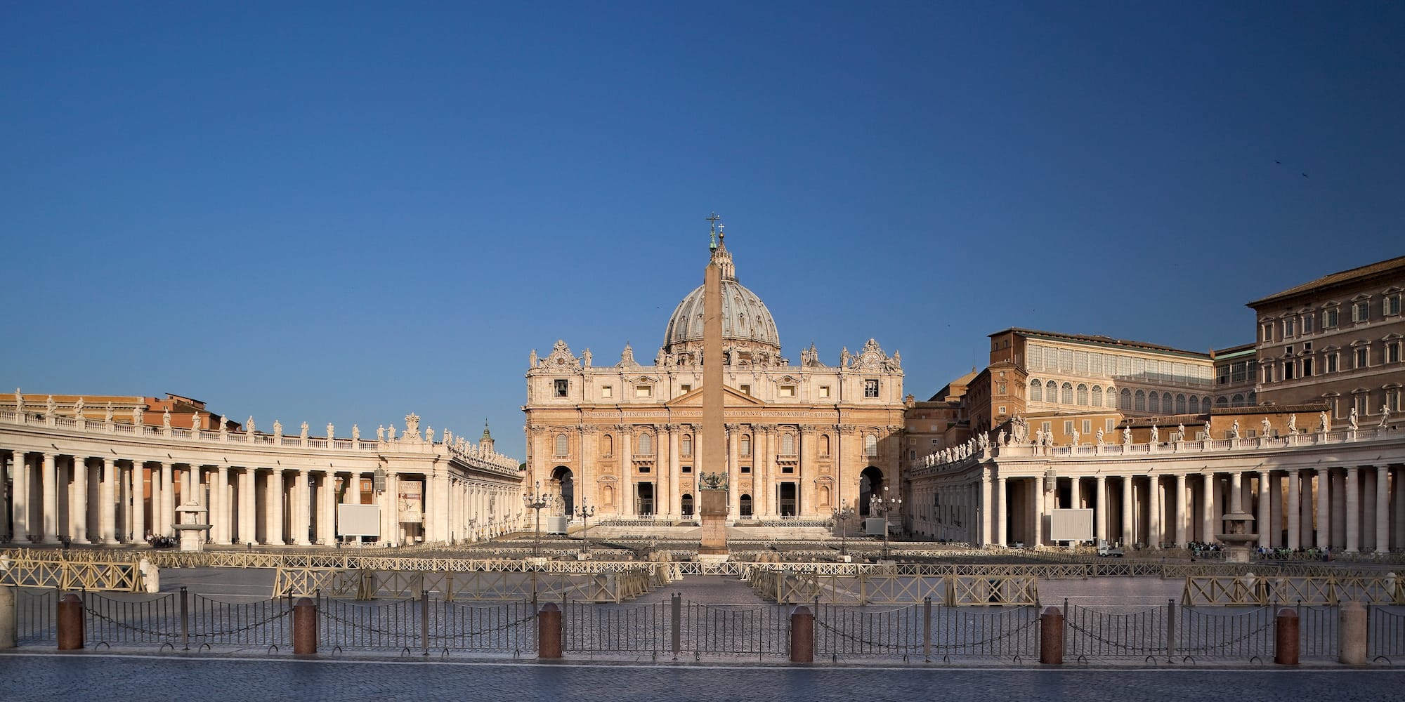 a large building with a dome and a pillar