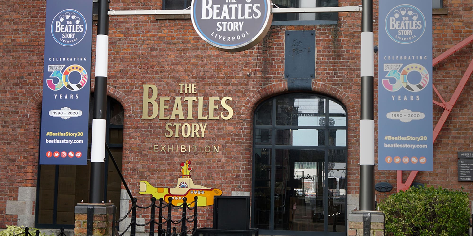 The Beatles Story exhibition, Liverpool, featuring banners and a Yellow Submarine.