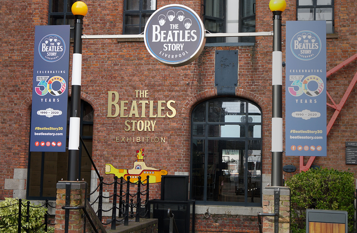 The Beatles Story exhibition, Liverpool, featuring banners and a Yellow Submarine.