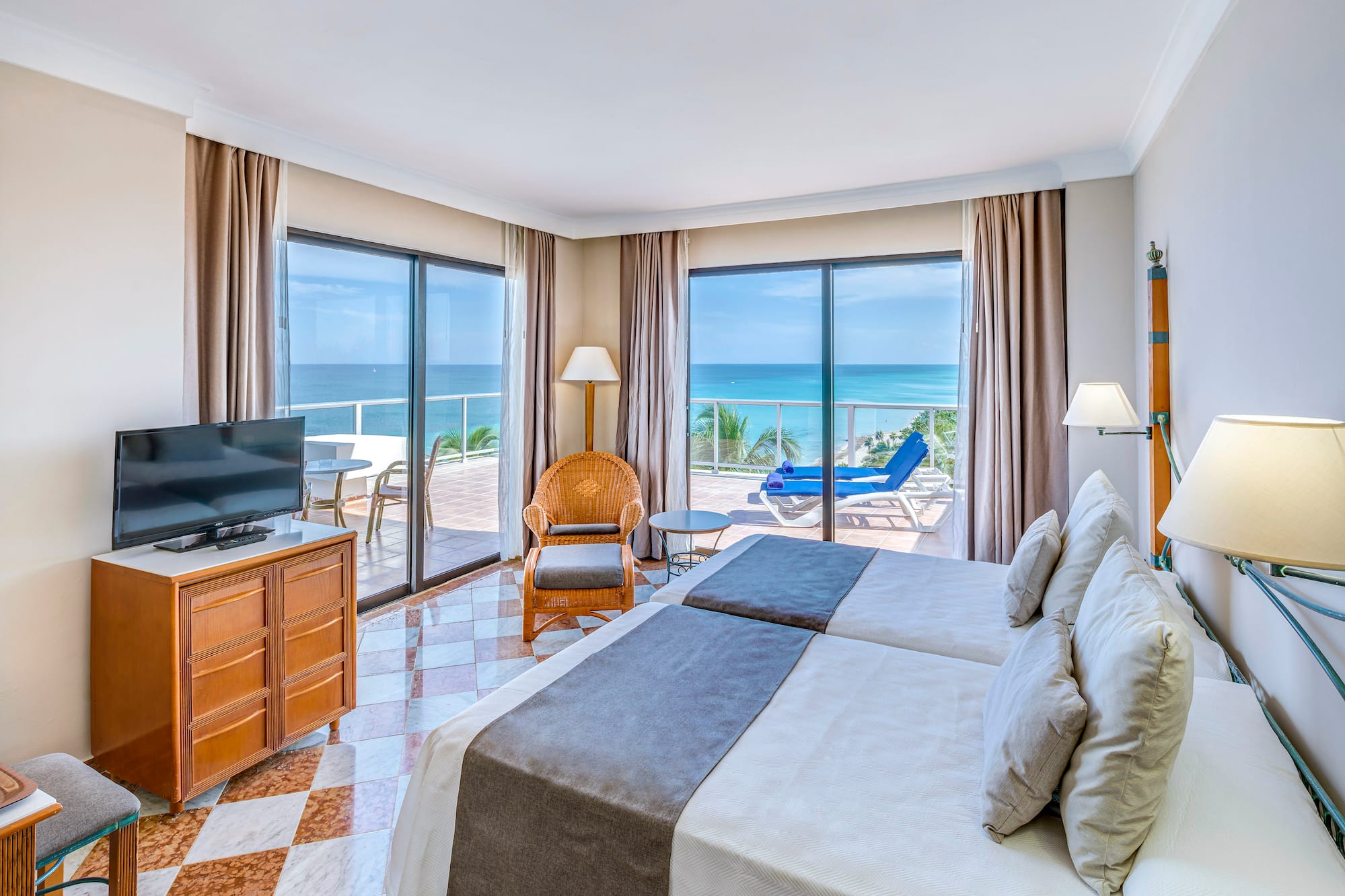 a room with a television and a bed