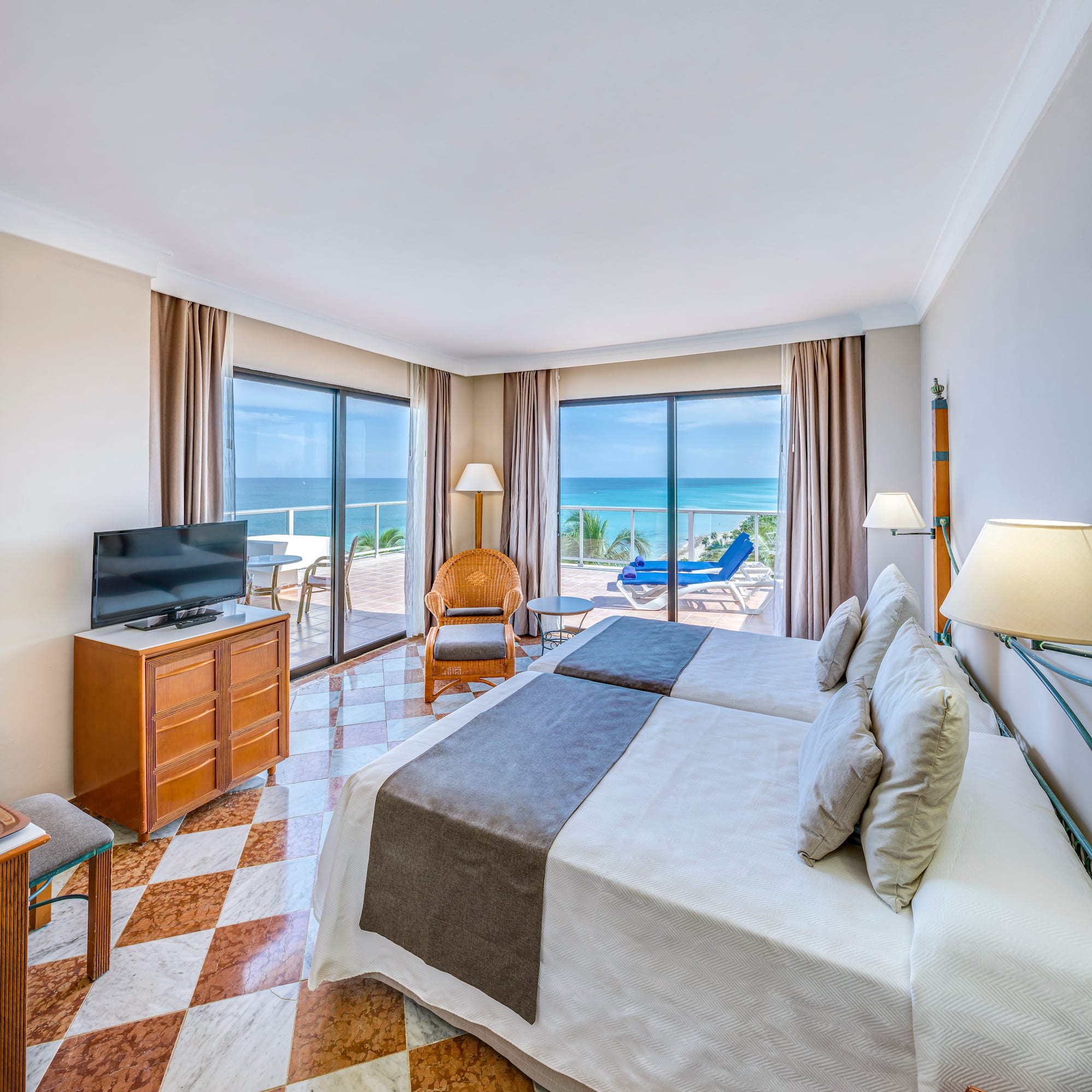 a room with a television and a bed