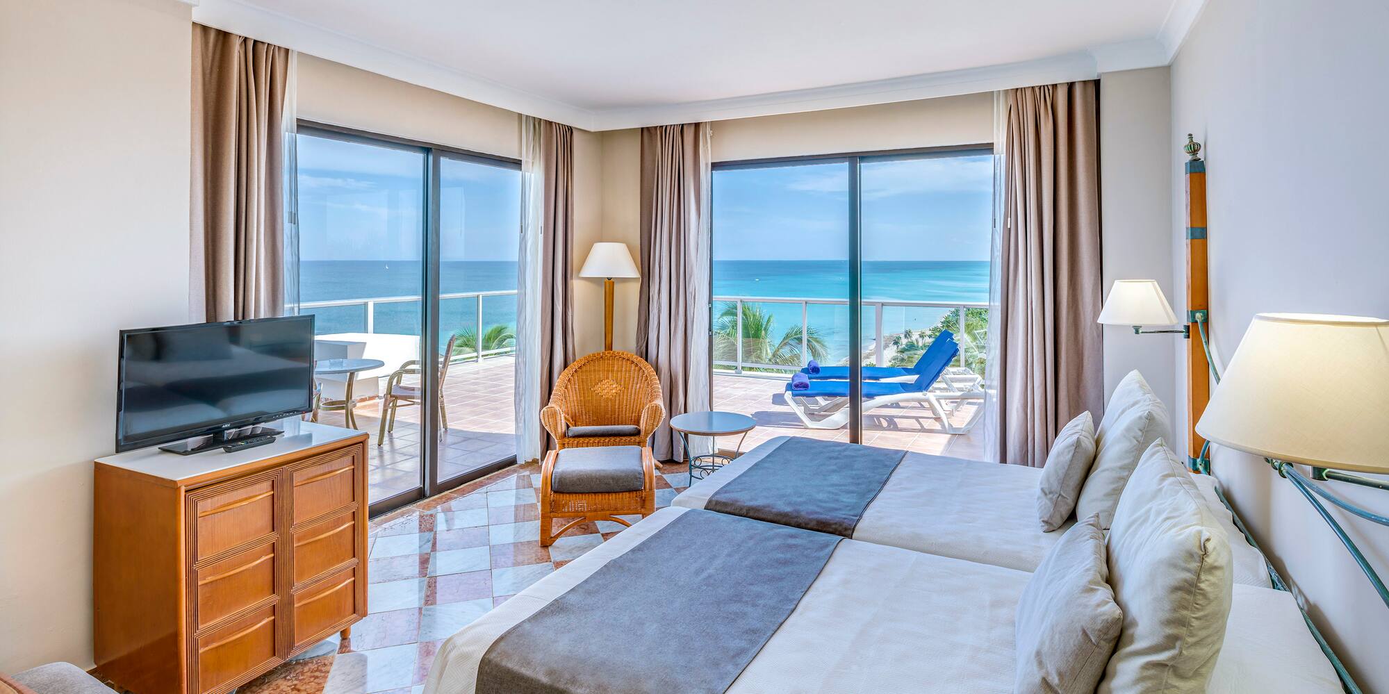 a room with a television and a bed