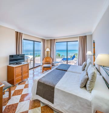 a room with a television and a bed