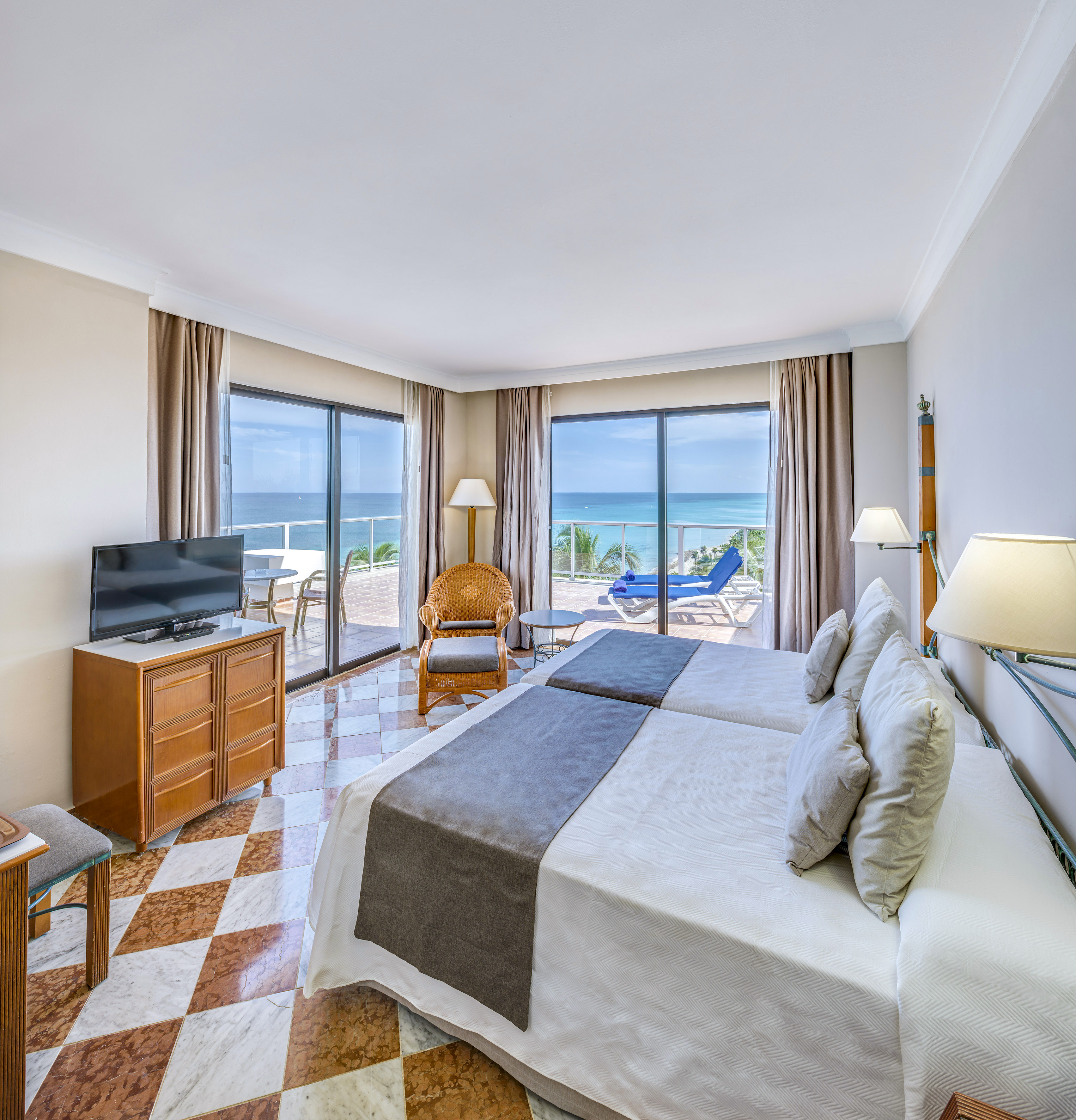 a room with a television and a bed